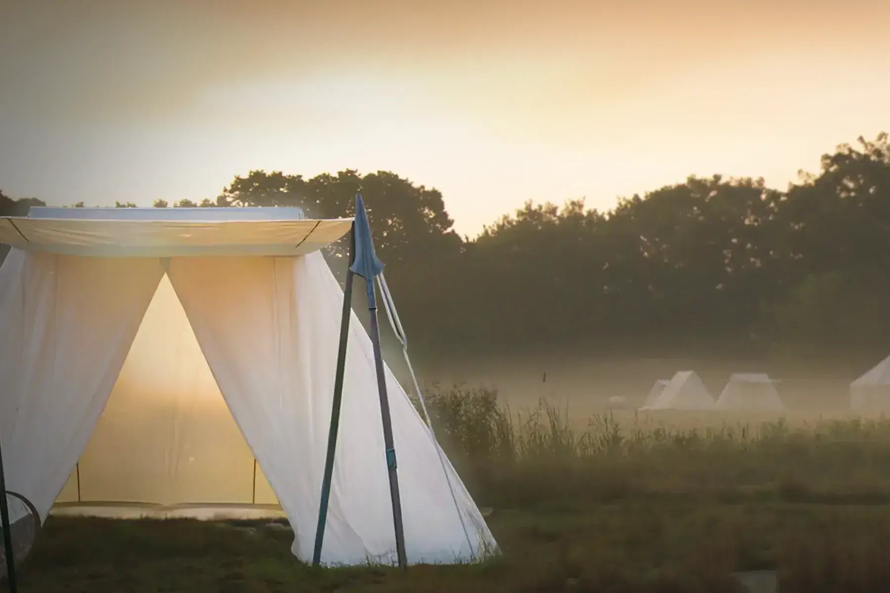 Solid Tent Solutions in a misty outdoor setting, showcasing the durable and elegant design of the tent.