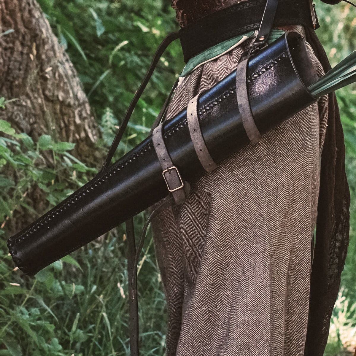 Quivers displayed on a belt, featuring a sleek black design, ideal for archery and cosplay.