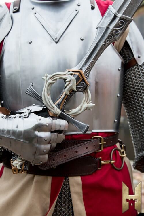 Stronghold foam sword held by armored knight, showcasing lightweight and stylish design for LARP combat.