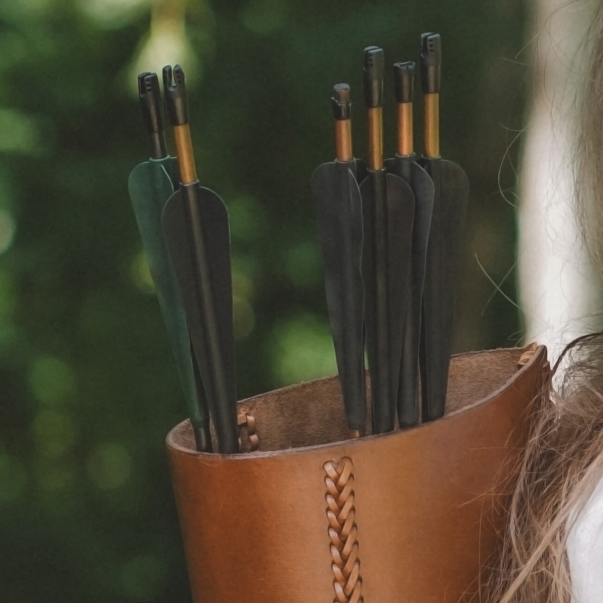 Arrows in a leather quiver ready for action, perfect for any hero's journey.