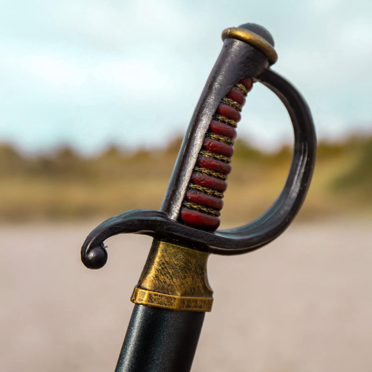 Close-up of a pirate sword handle from the Pirate Swords collection, showcasing its intricate design and craftsmanship.
