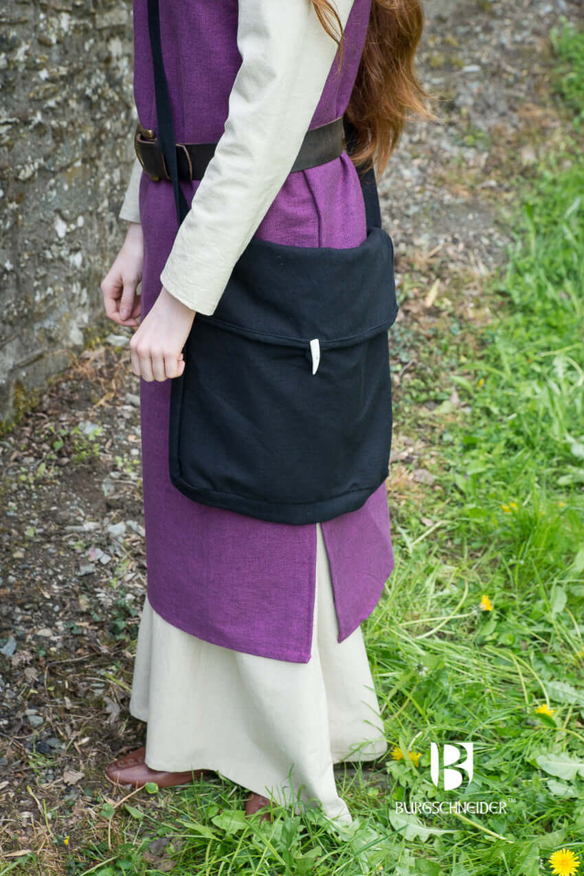Bag Ehwaz worn as a medieval accessory with a long strap, showcasing its versatile design and authentic appearance.
