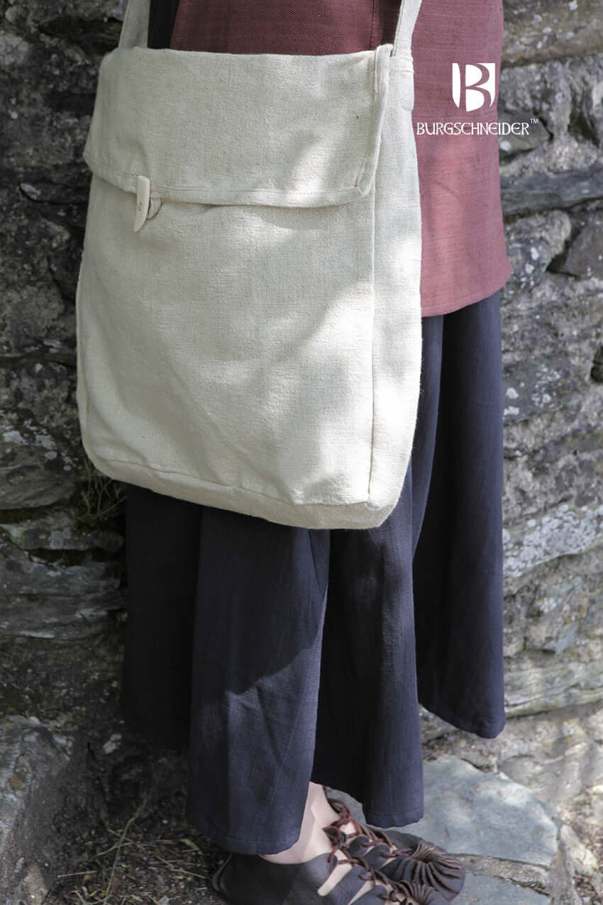 Bag Ehwaz worn as a medieval accessory, showcasing its rustic design and authentic style, made by Burgschneider.