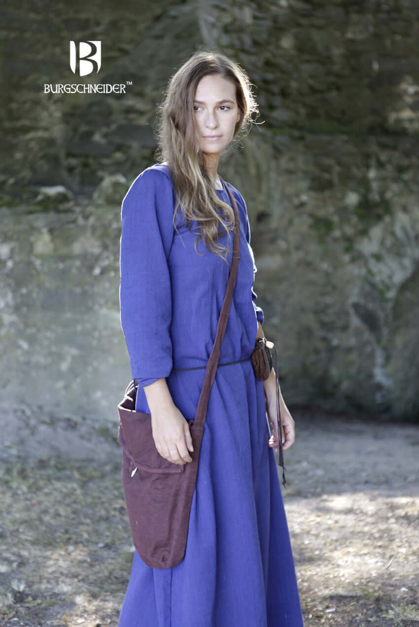 Woman wearing Bag Ehwaz by Burgschneider, featuring a medieval style in a natural setting.