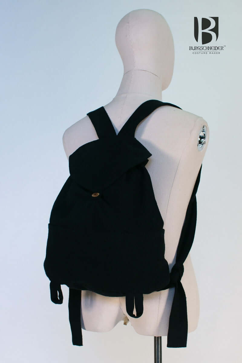 Backpack Capsus displayed on a mannequin, showcasing its compact design and adjustable straps for travelers.