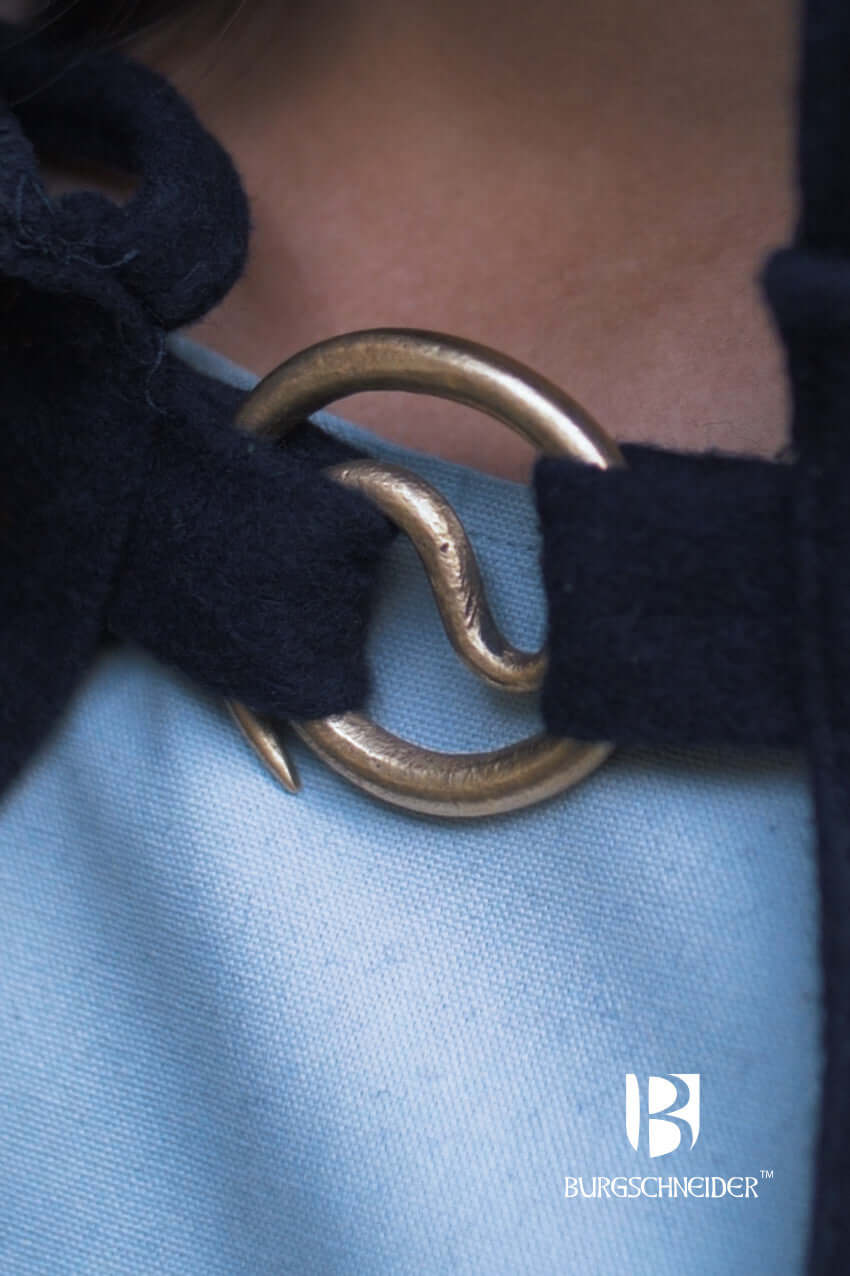 Brooch Spiral Brooch Lukk is a stylish fastening for cloaks and capes with a unique spiral design.