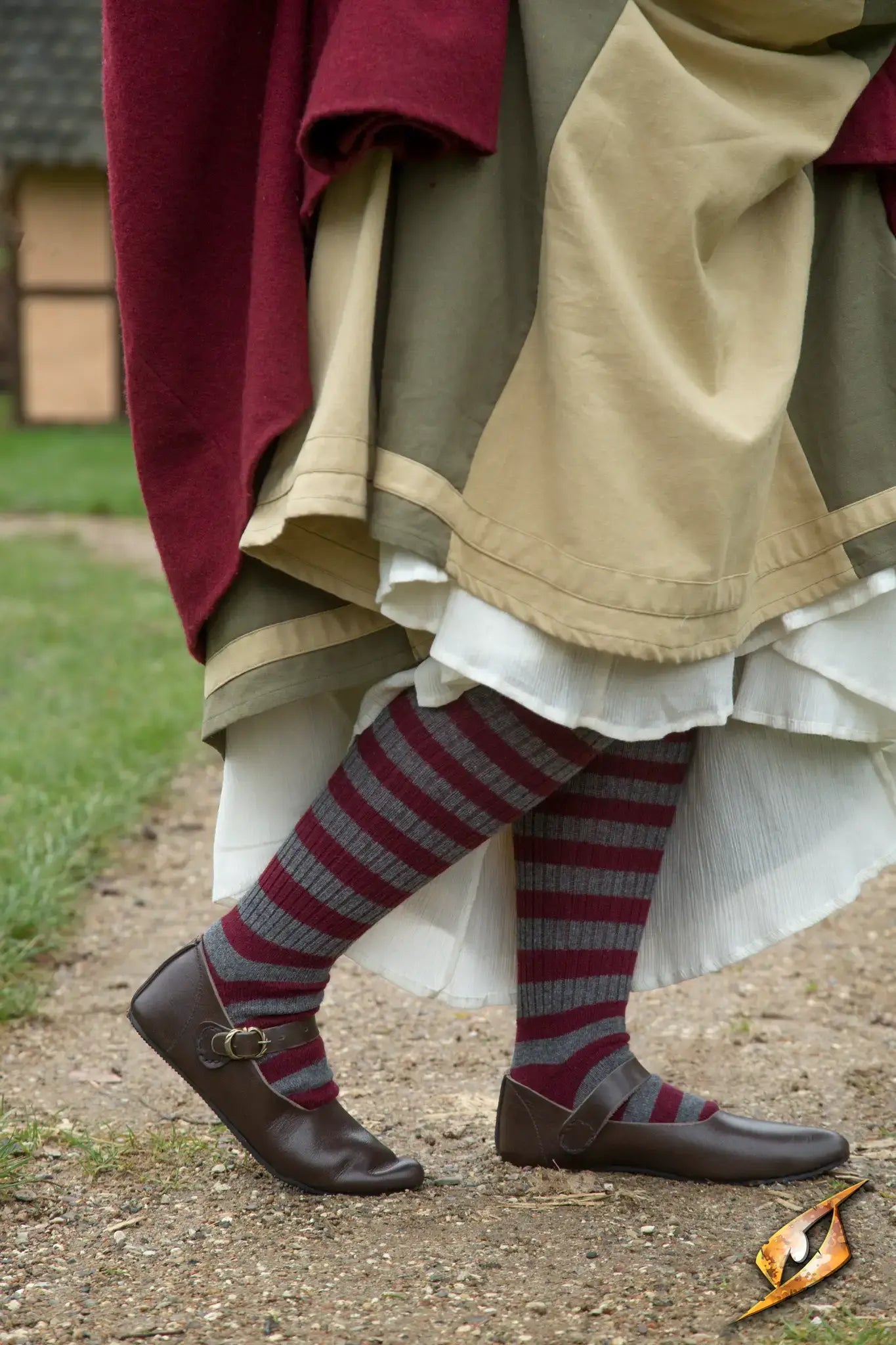 Shoes Astrid worn with striped socks, showcasing classic style for women in historical attire.