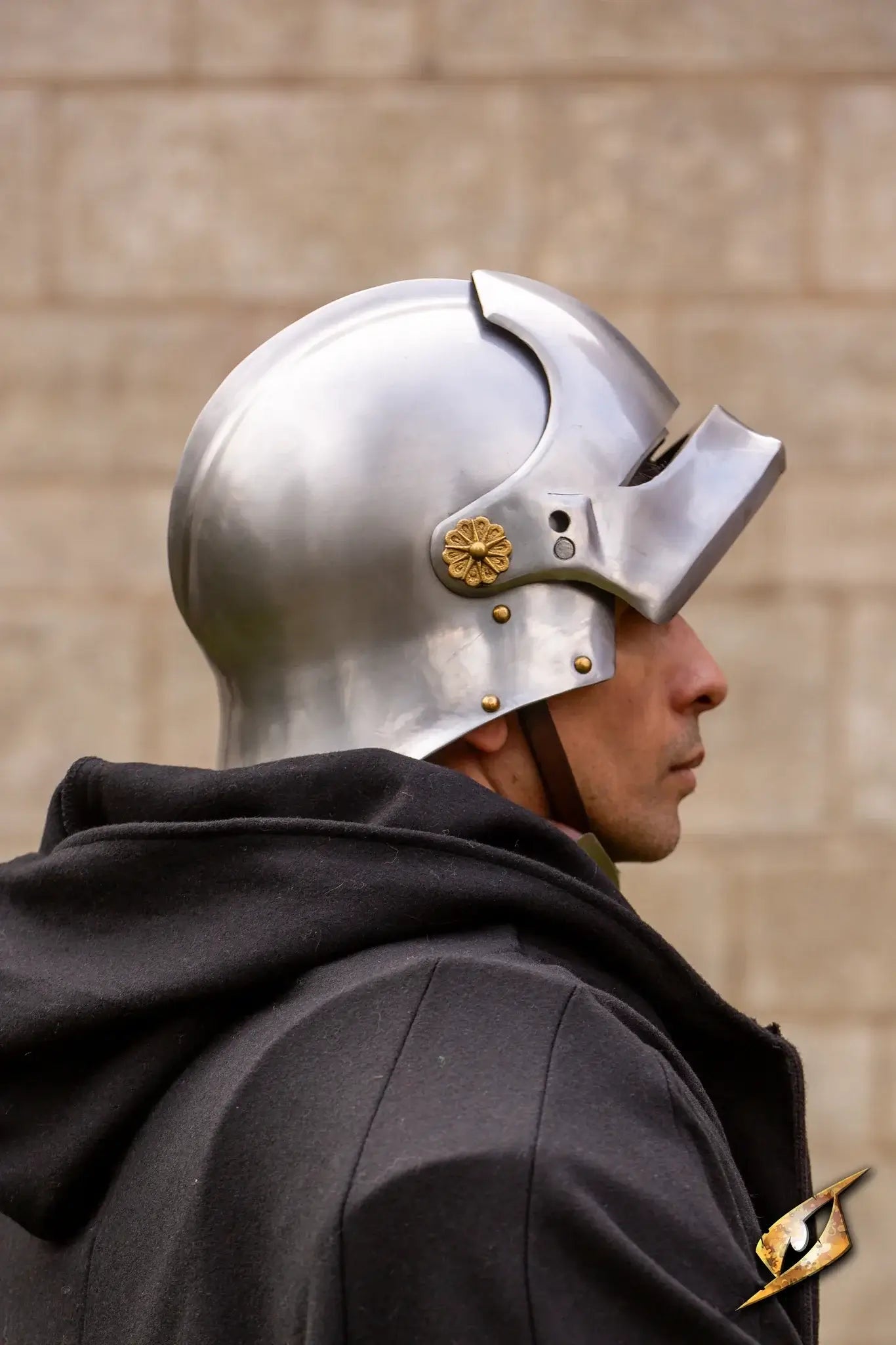 Profile view of a soldier wearing the Renegade Helmet, showcasing its metallic design and unique features.