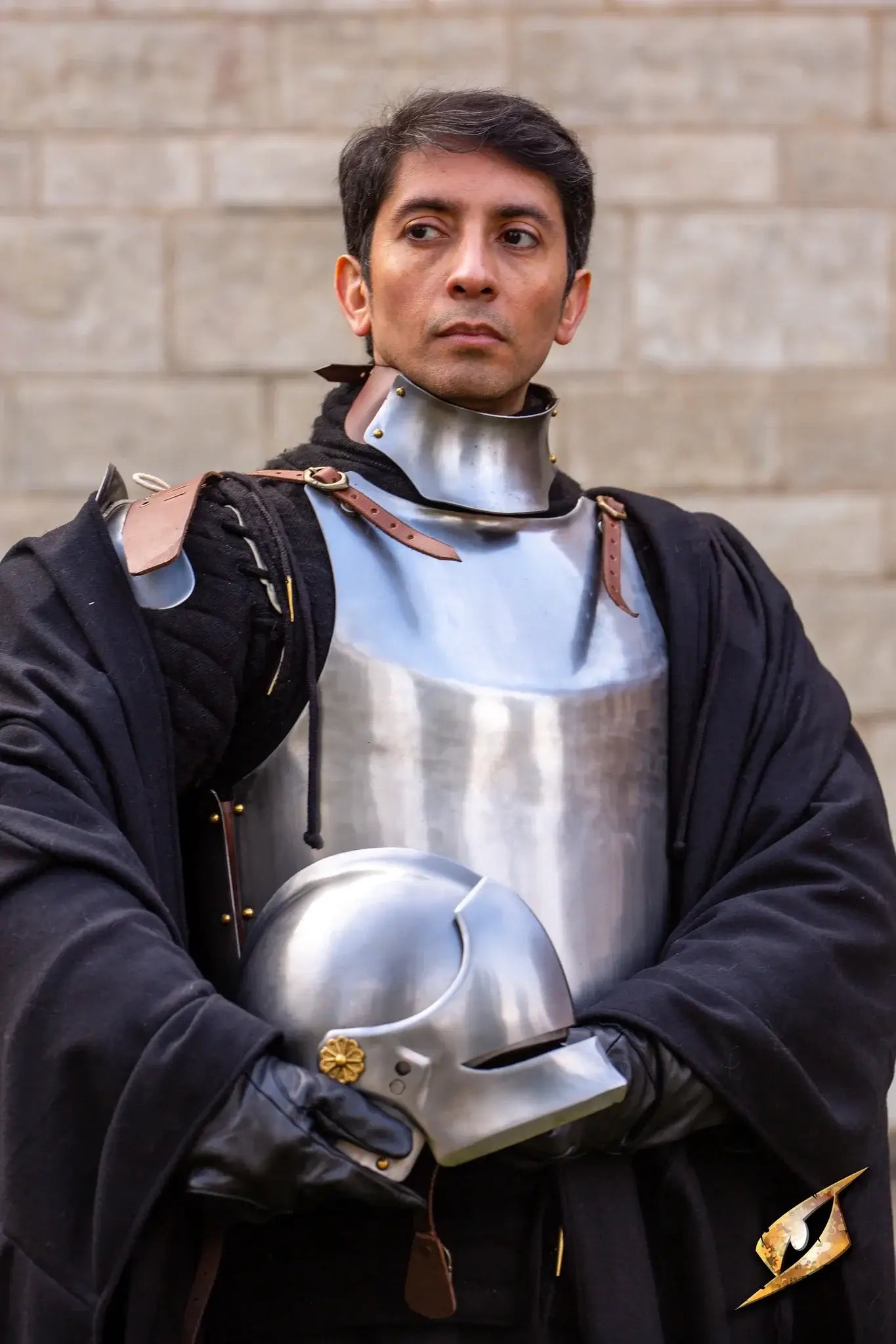 Renegade Helmet worn by a soldier, showcasing medieval armor and battle-ready attire.
