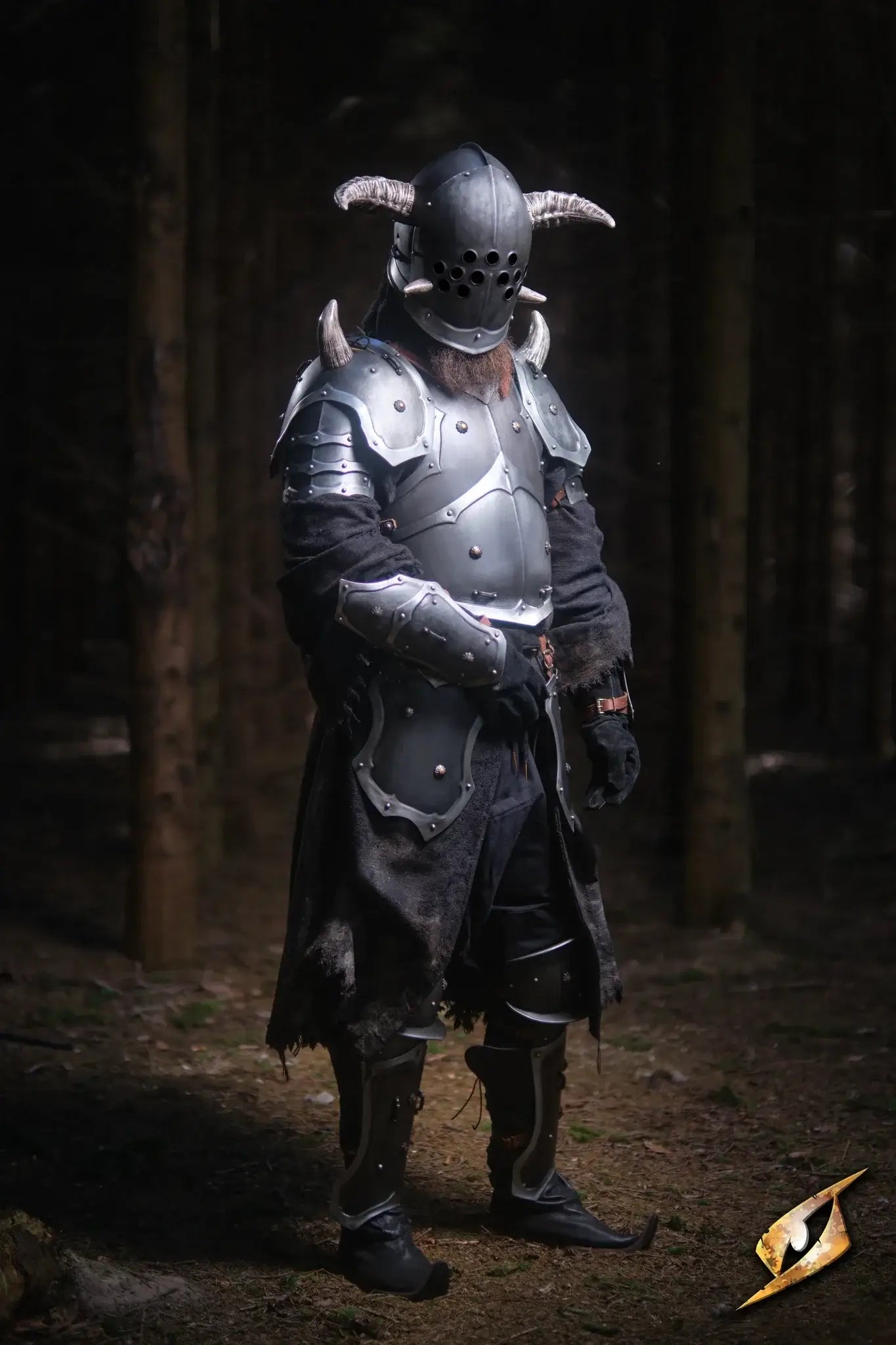 Mountable Demon Horns mounted on dark armor in a forest setting, adding a monstrous look to the warrior's outfit.