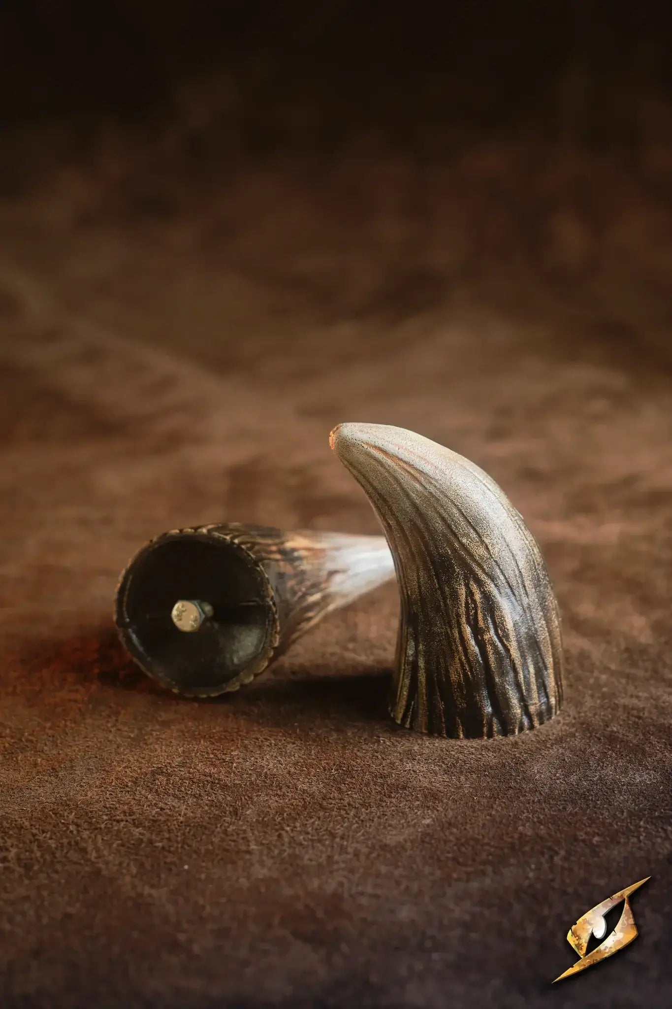 Mountable Demon Horns close-up on a textured surface, showcasing the detailed design and mounting options.