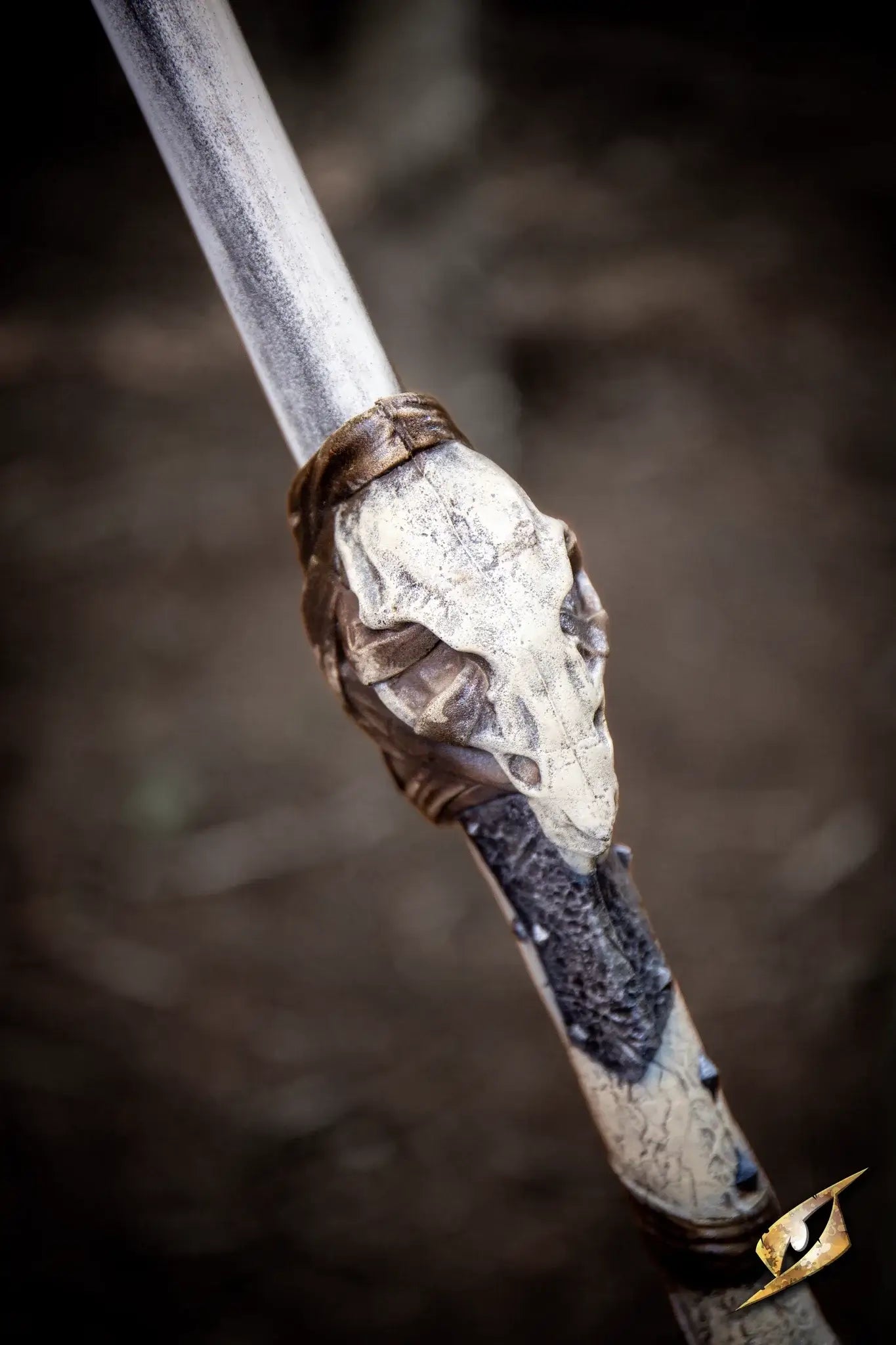 Bone Chopper - 100 cm. close-up of the ornate skull handle, showcasing the intricate design and dark aesthetic details.