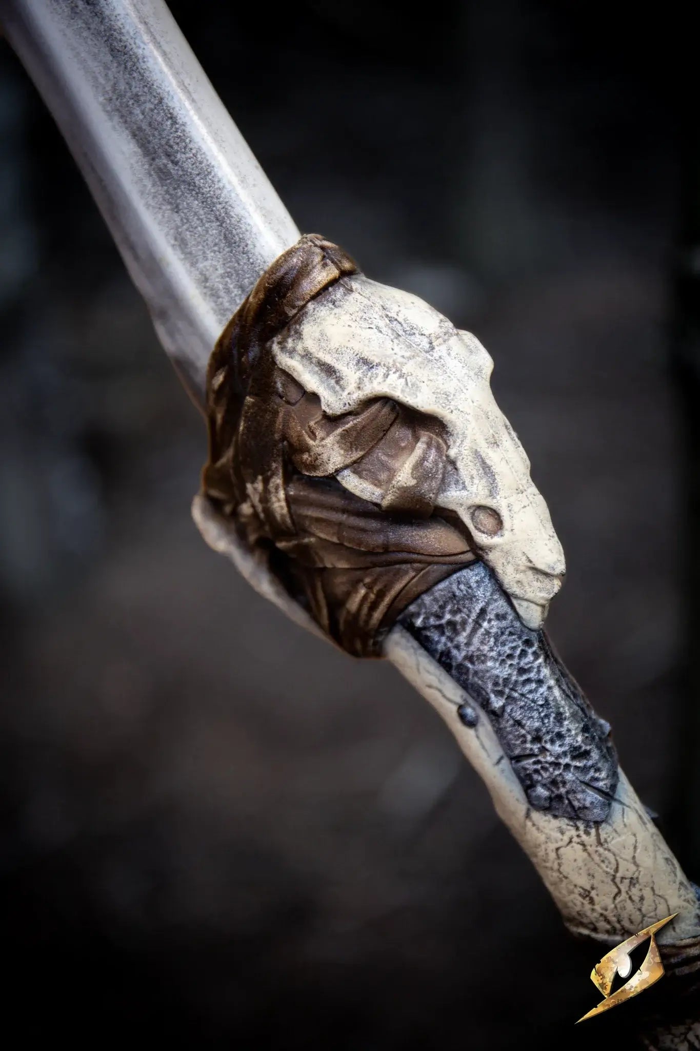 Bone Chopper - 100 cm. close-up of the handle with bone and leather details, showcasing its sinister design.
