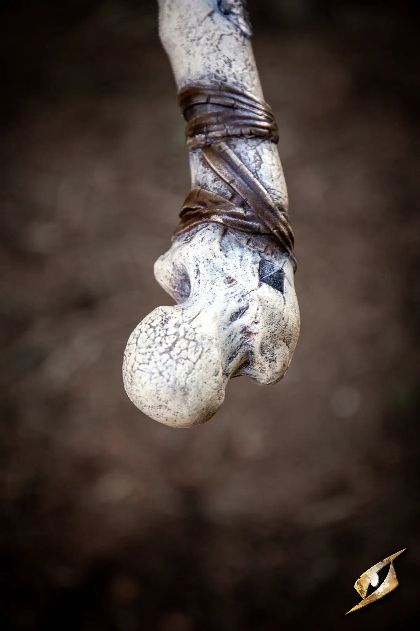Bone Chopper - 100 cm. close-up of an intricately designed weapon made from bone.