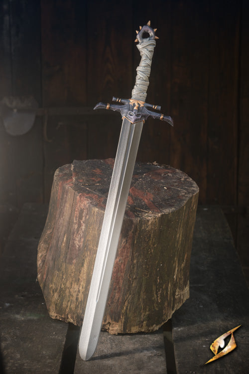 Marauder Sword displayed on a wooden stump, showcasing its crafted design and detailing for LARP combat.
