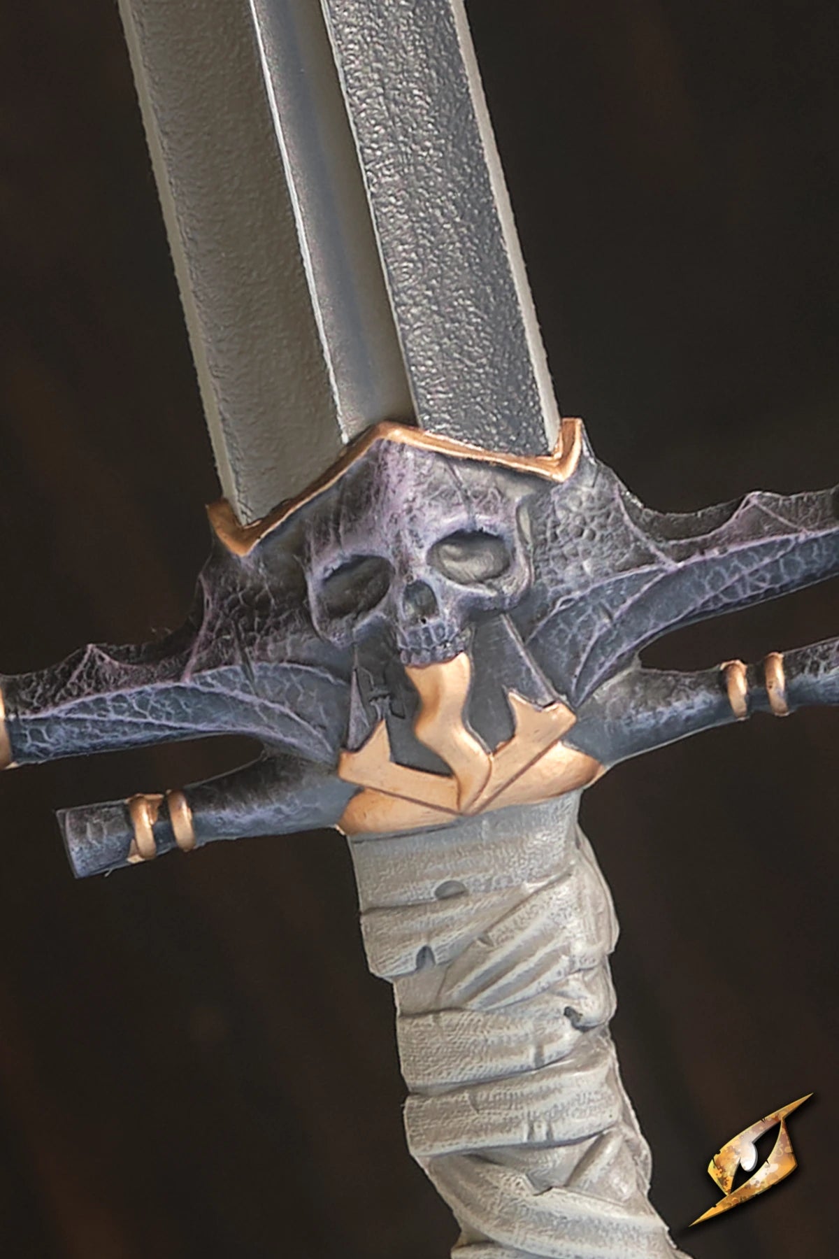 Marauder Sword close-up featuring ornate skull and bat motifs on the hilt, perfect for LARP combat.