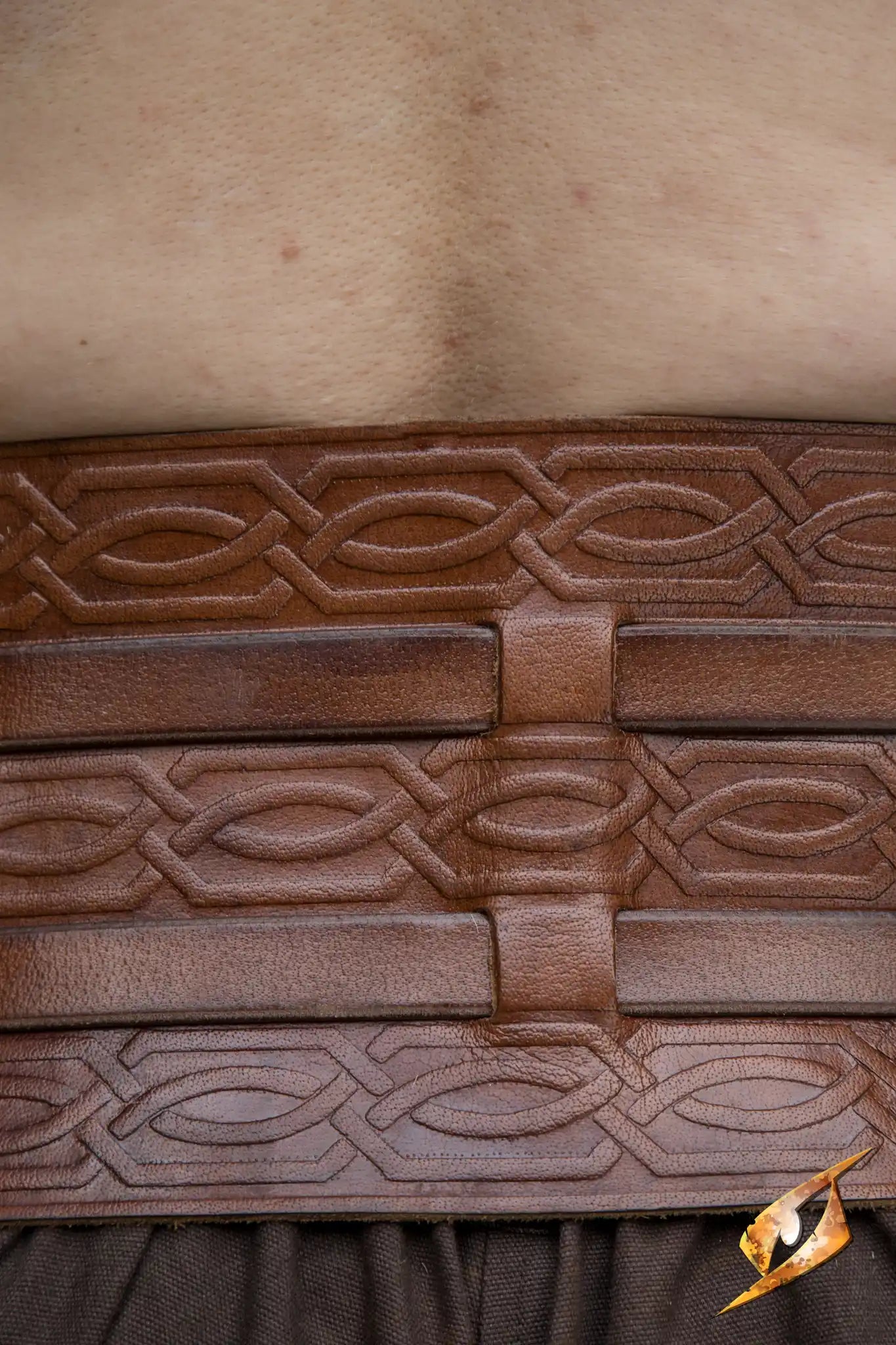 Closeup of Gut Plate Leather Belting