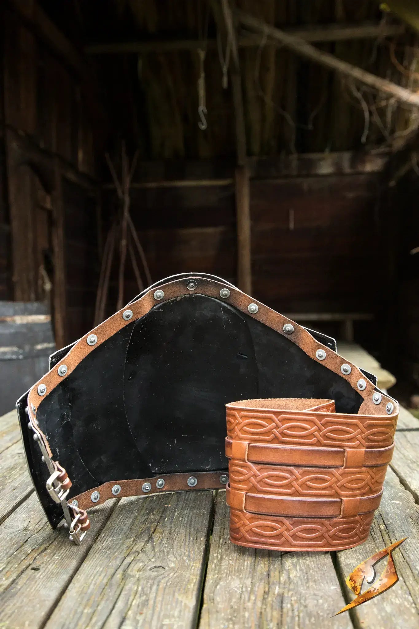 Gut Plate from the back, with leather belting folded