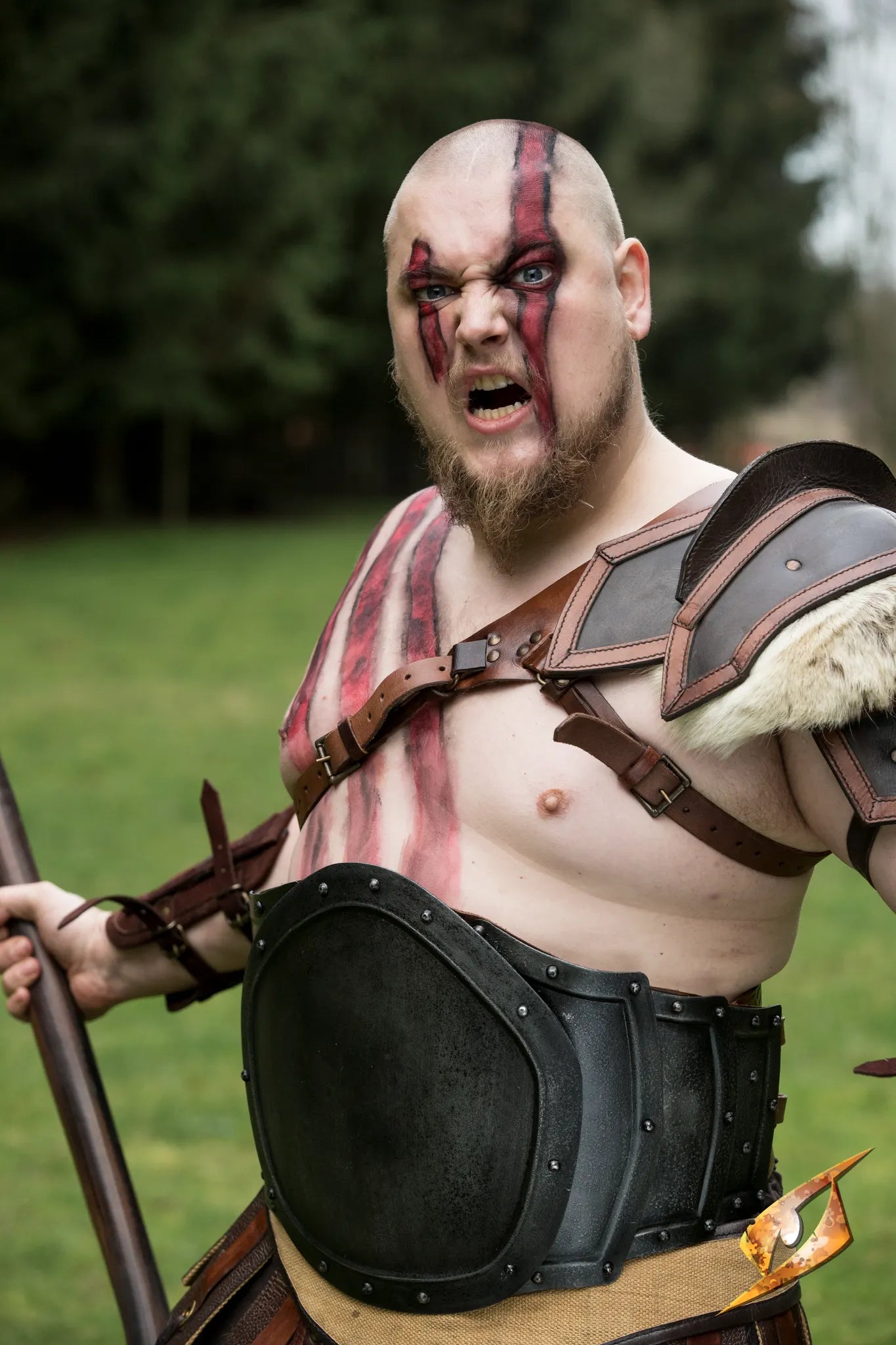 1 male barbarian wearing a gut plate and shoulder piece