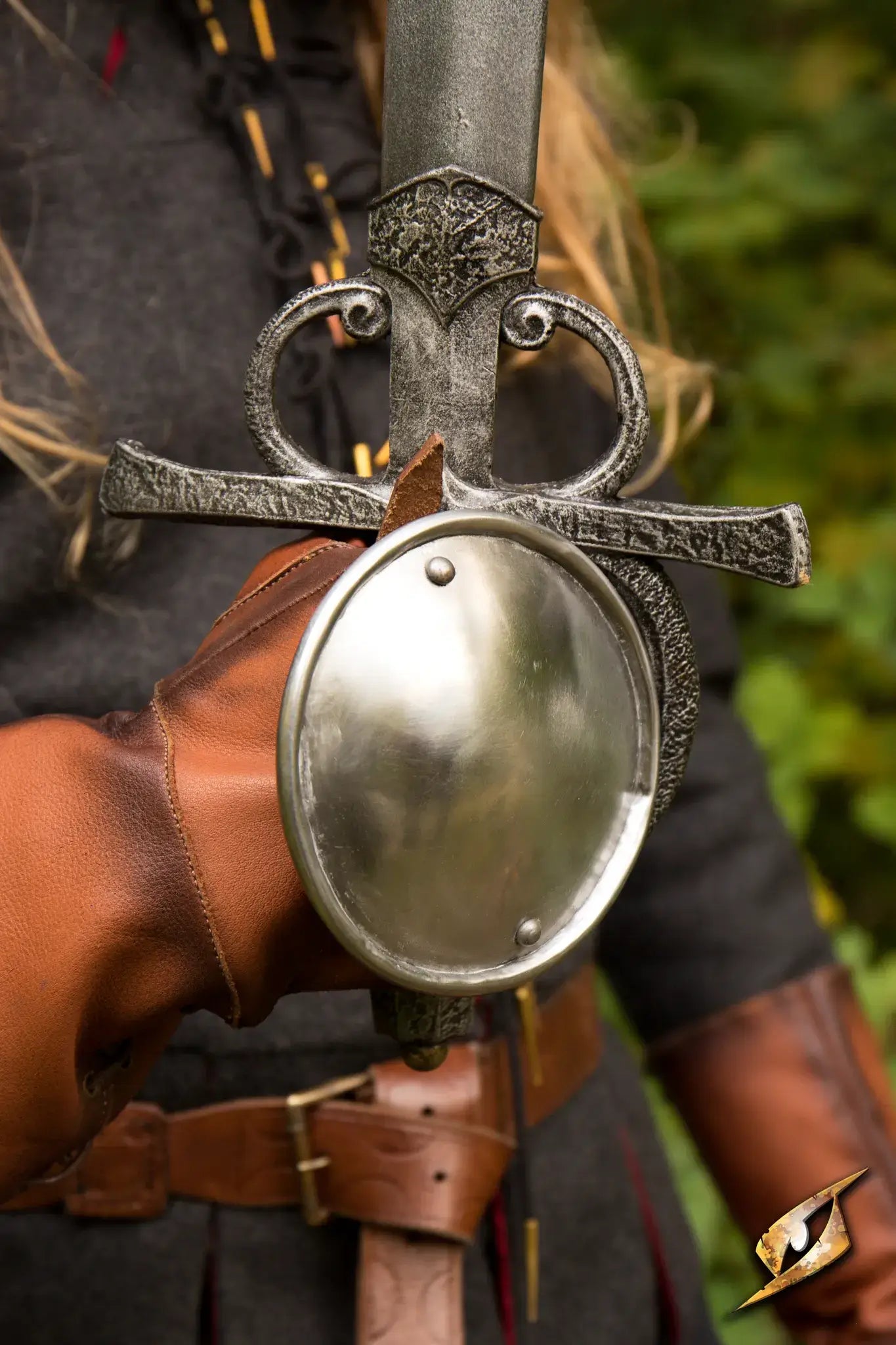 Rondel Hand Protection worn while holding a sword, showcasing essential gear for fencers.