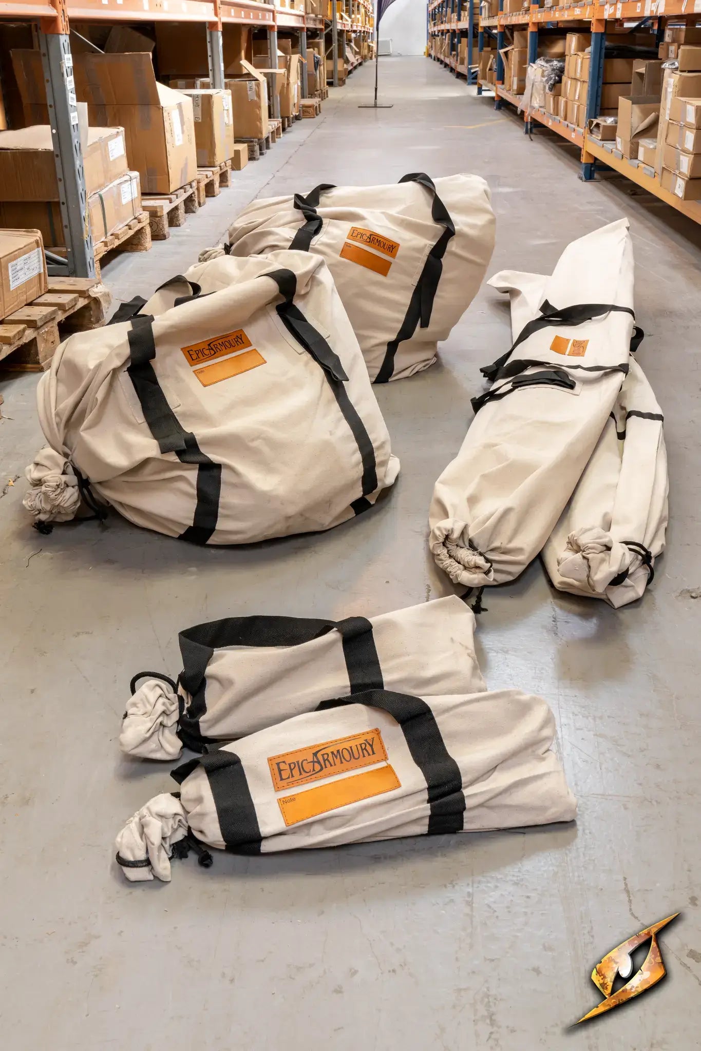 Marquee Tent - 4x4m storage bags displayed on a warehouse floor, showcasing packaging and organization for easy transport.