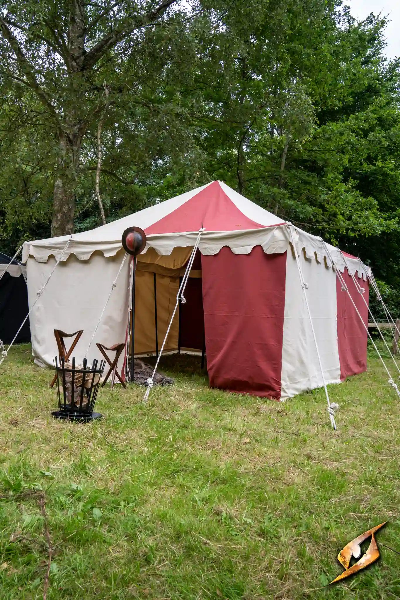 Marquee Tent - 4x4m set in a grassy area, featuring a red and white canopy with side flaps.