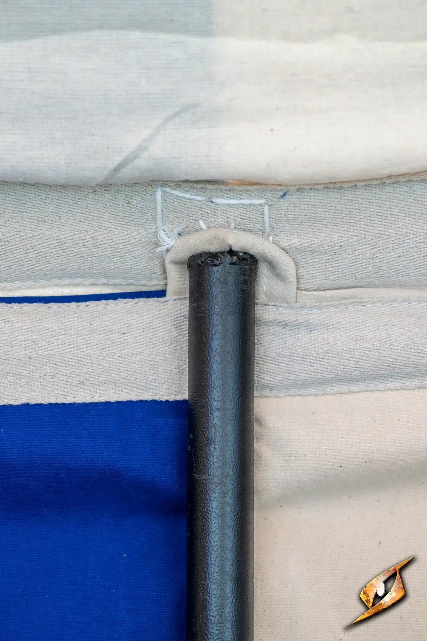 Marquee Tent - 4x4m close-up of tent fabric and metal pole, showcasing sturdy construction and design details.