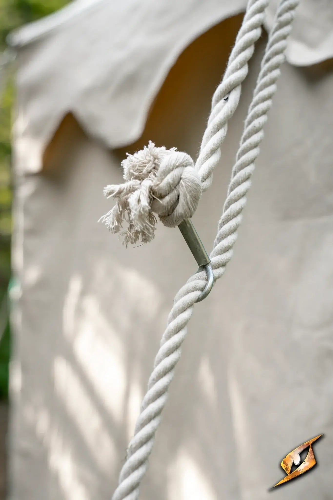 Close-up of a rope knot and metal hook on a Marquee Tent - 4x4m, showcasing its sturdy design.