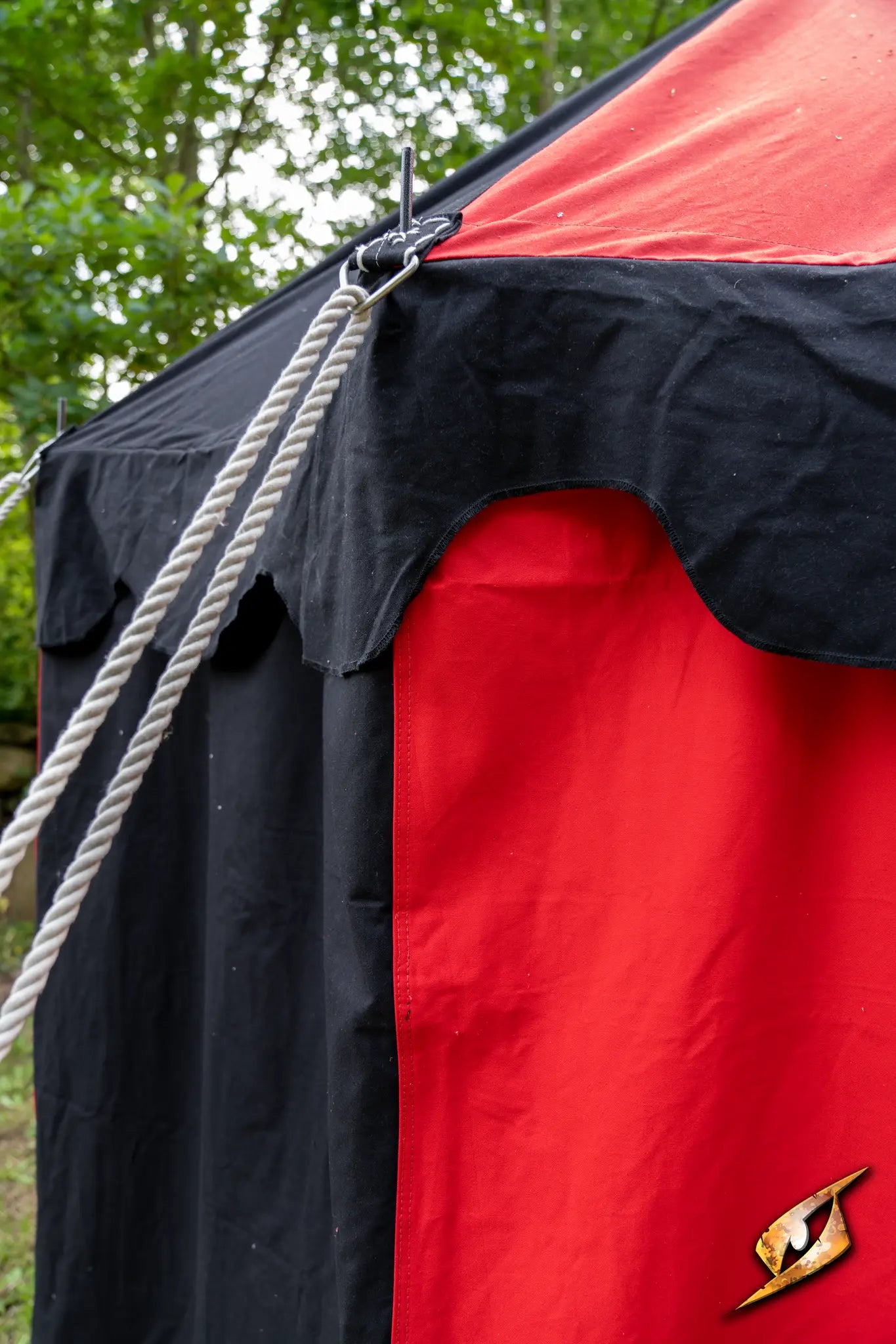Marquee Tent - 4x4m close-up showing the red and black fabric with rope attachments.