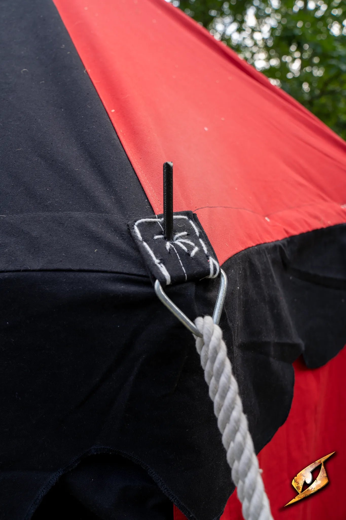 Marquee Tent - 4x4m showing red and black fabric detail with rope and hook for securing the tent.