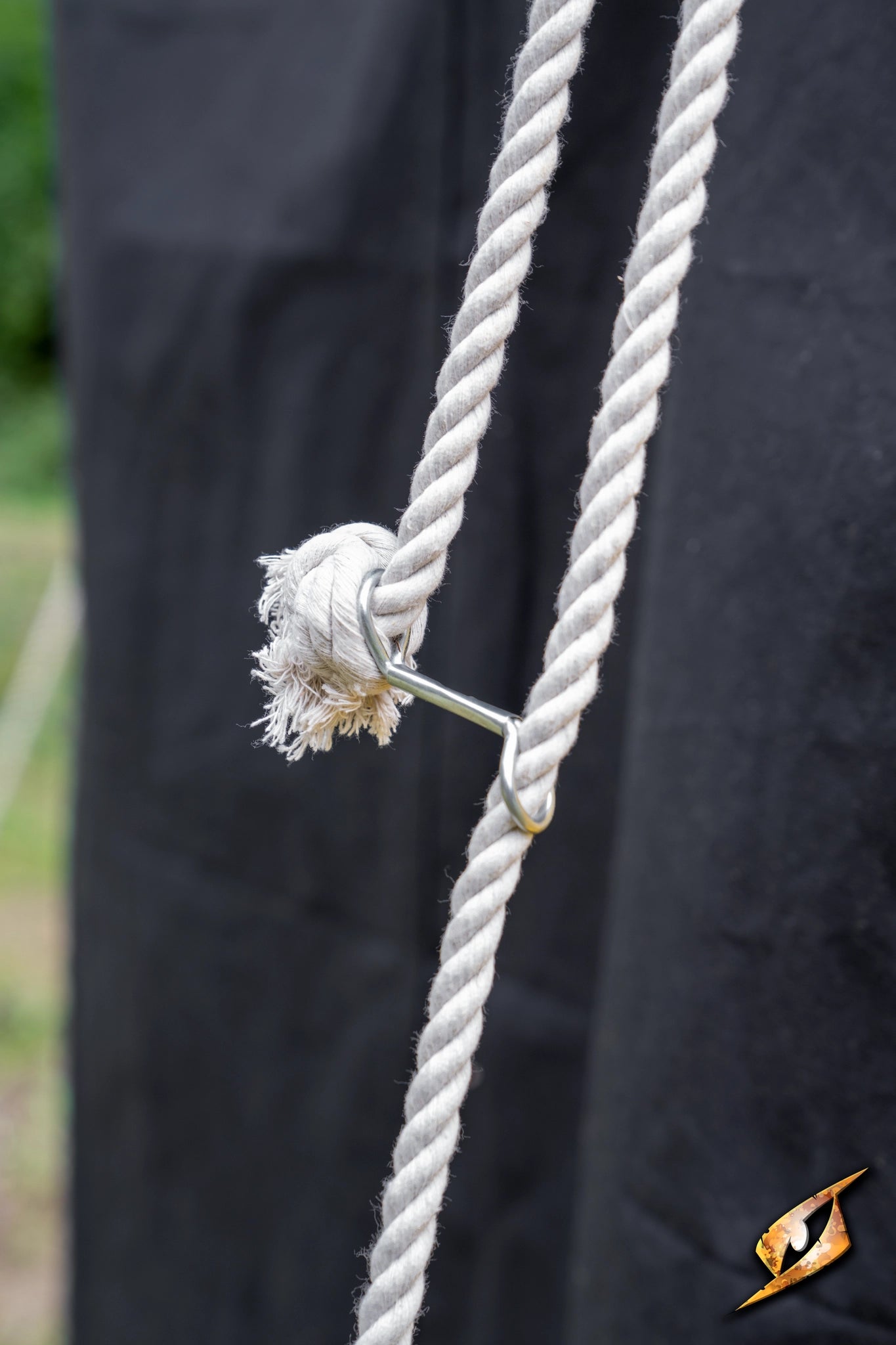 Close-up of rope and peg detail for Marquee Tent - 4x4m, showcasing durable materials for stability and support.