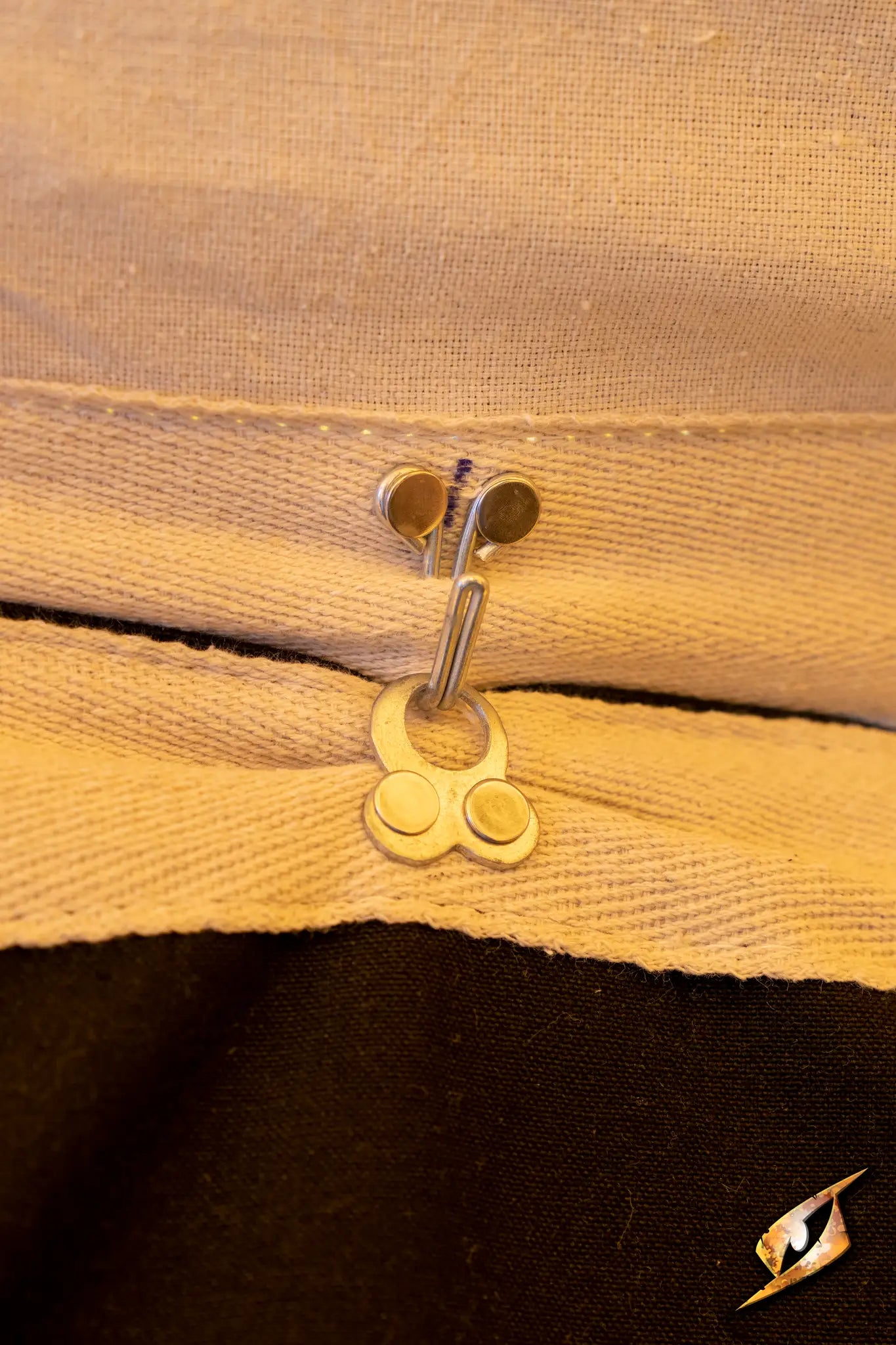 Close-up of the zipper mechanism on a Marquee Tent - 4x4m fabric, showcasing its durable materials and construction.