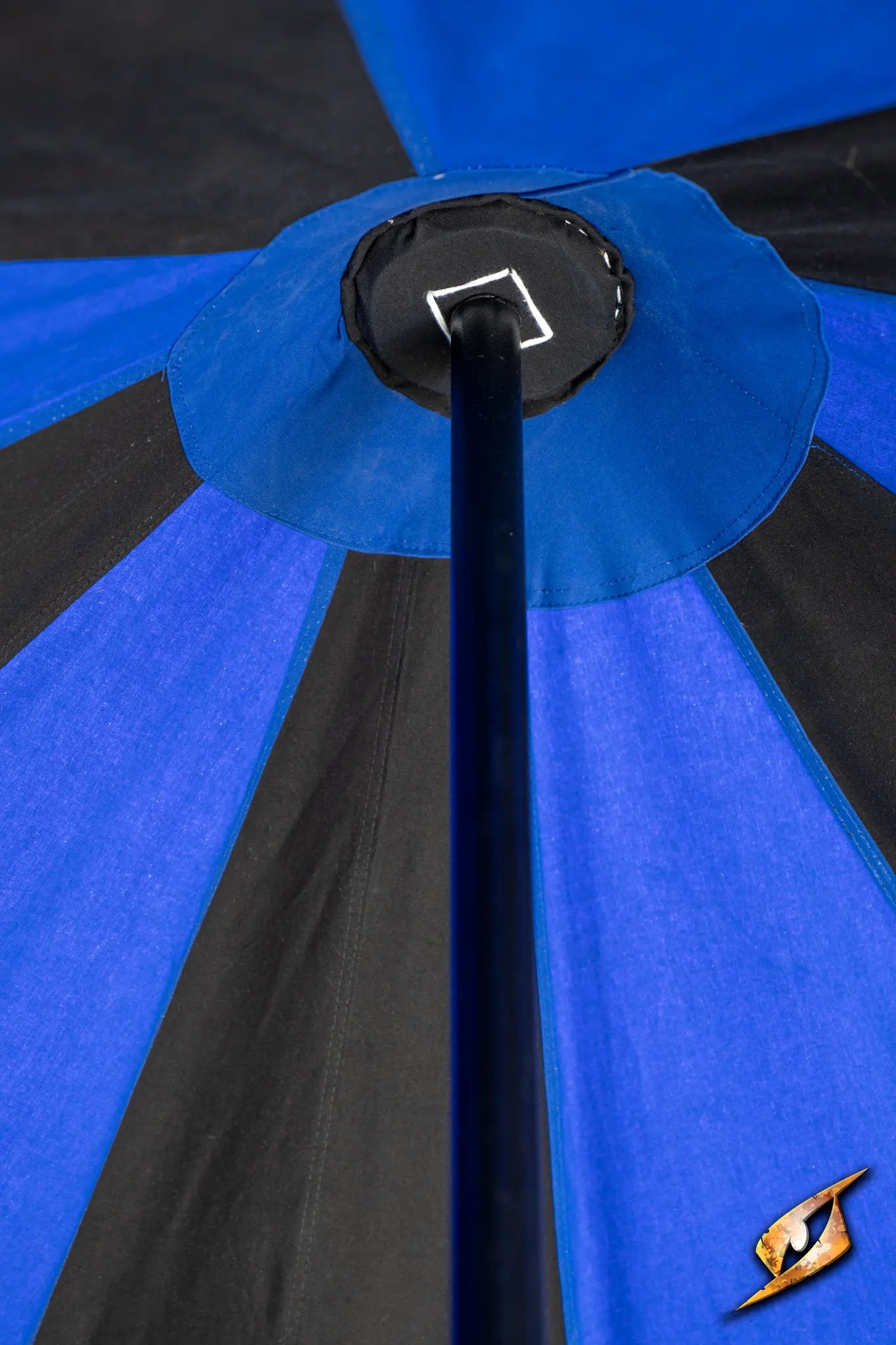 Marquee Tent - 4x4m close-up view of the top featuring blue and black fabric patterns and central pole.