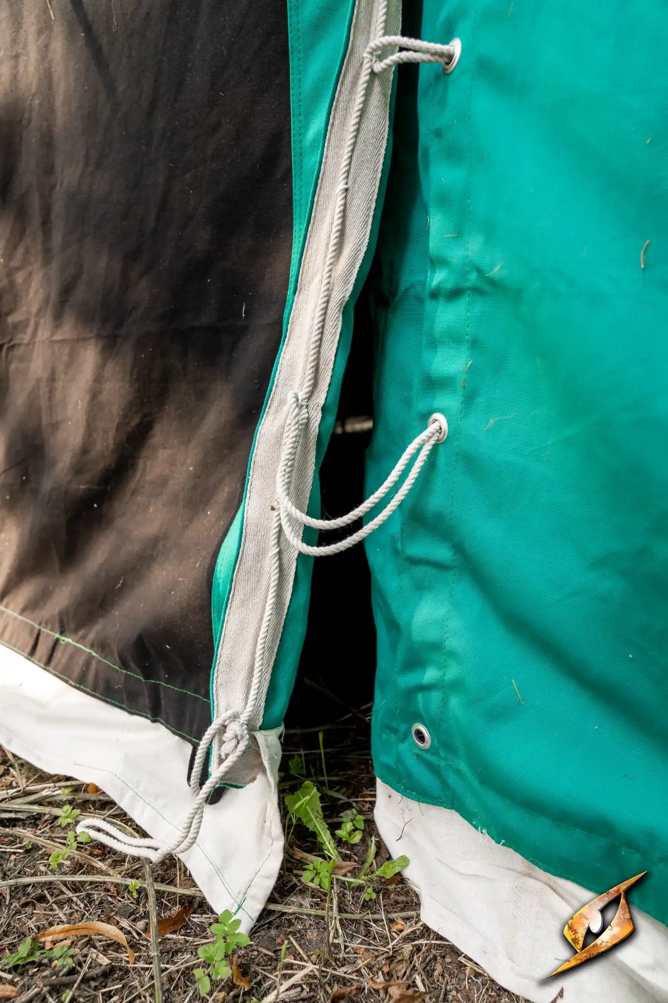 Close-up of the Marquee Tent - 4x4m fabric with ties and seams, showcasing its durable design.