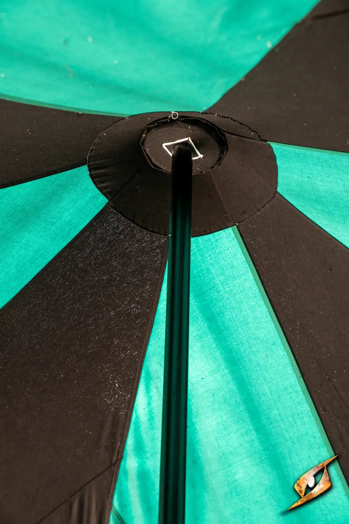 Close-up of a green and black Marquee Tent - 4x4m showing the pole and fabric design.