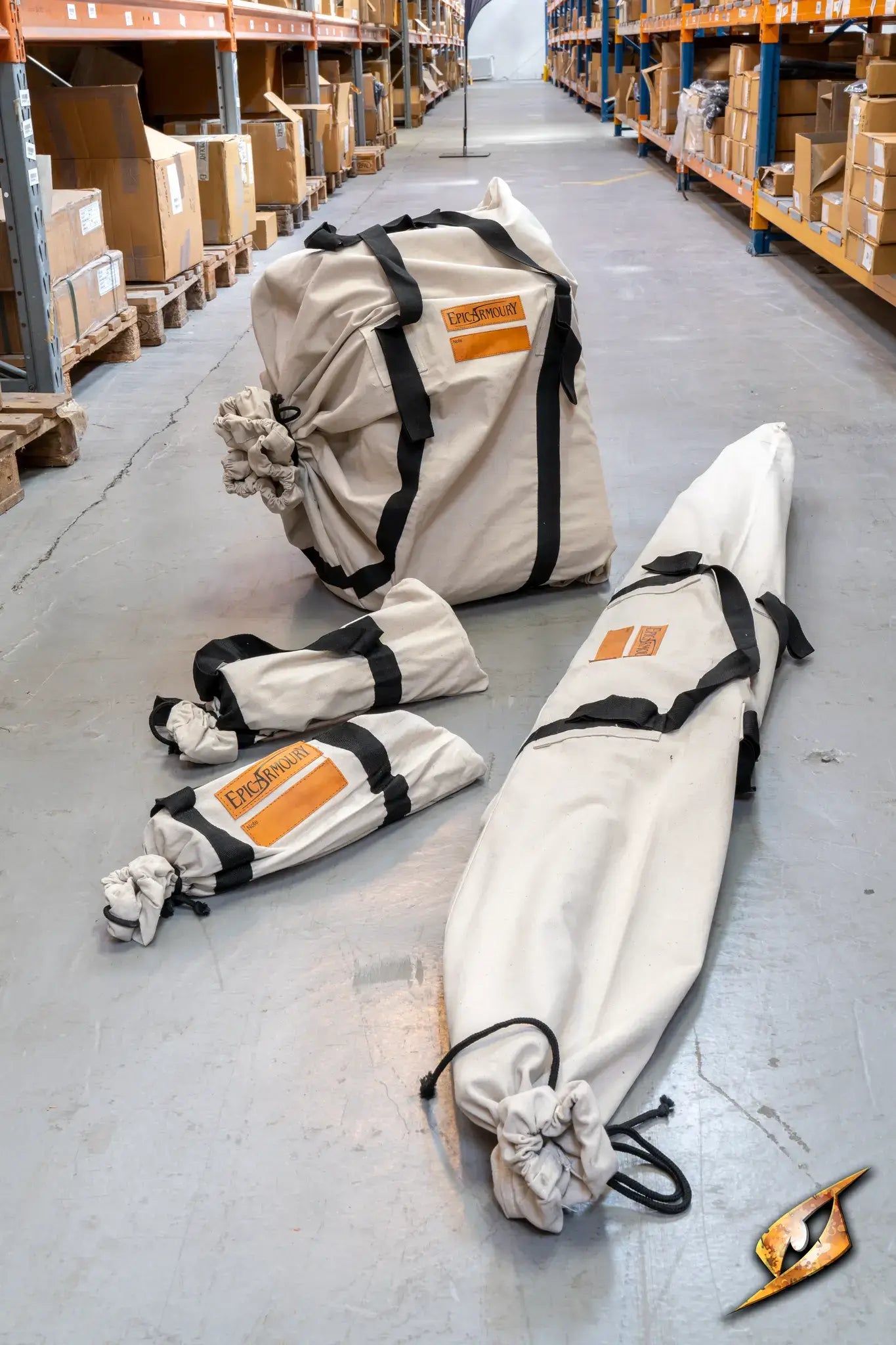 Marquee Tent - 4x6m storage bags displayed in a warehouse with other packaged items.