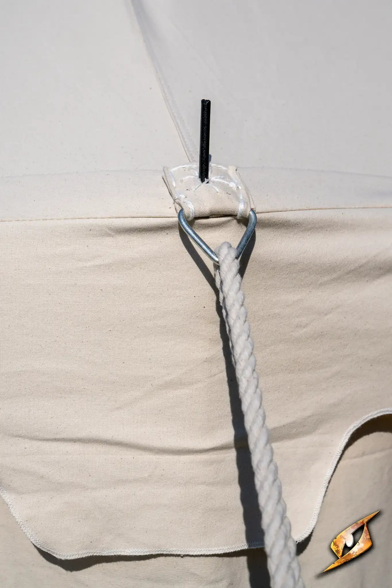 Close-up of Marquee Tent - 4x6m attachment point with rope and stake.