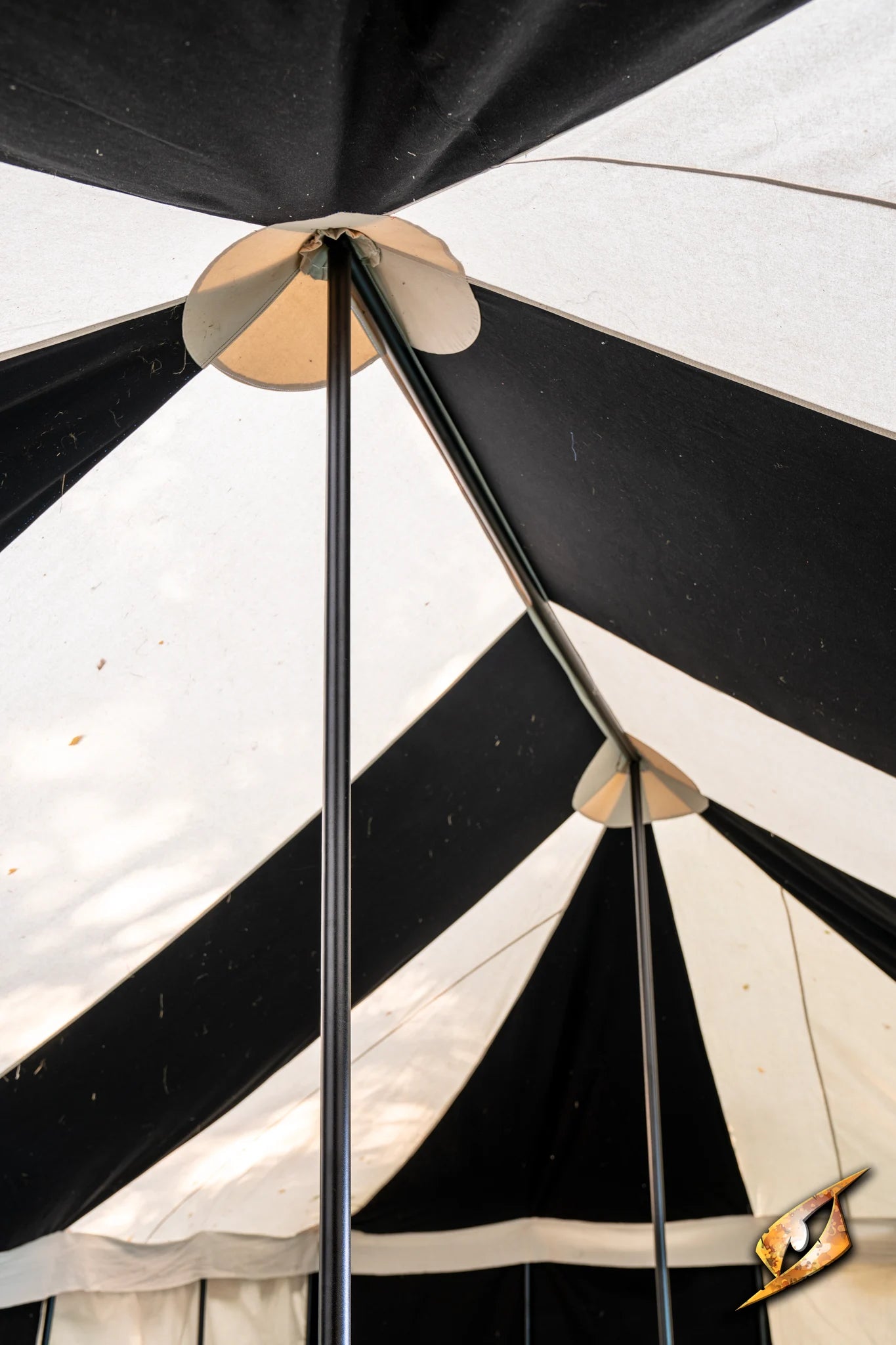 Interior view of a Marquee Tent - 4x6m featuring striped fabric and central support poles.