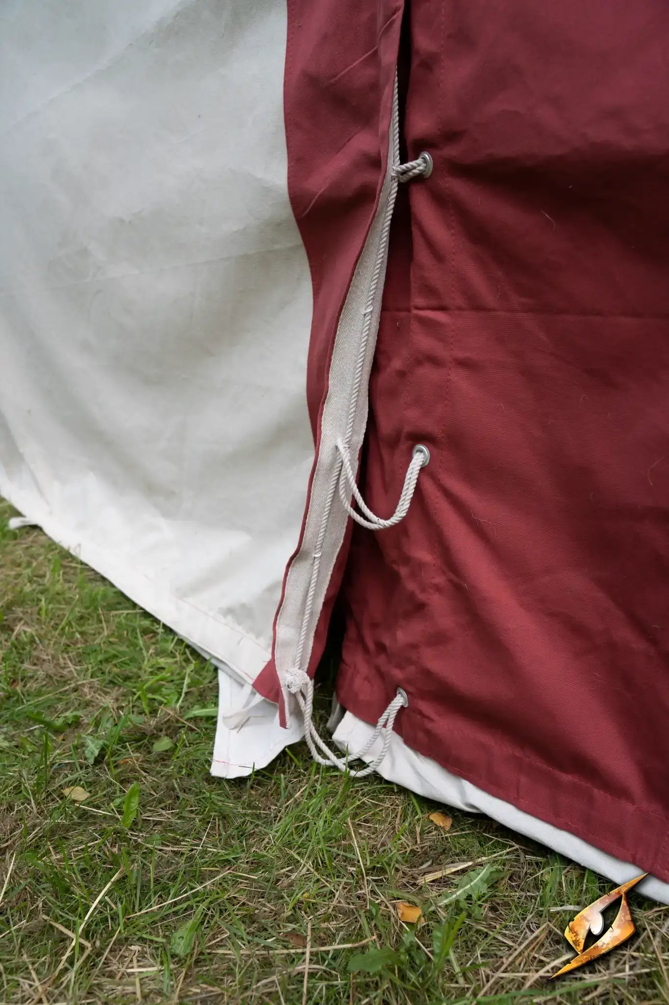 Close-up of the side of a Marquee Tent - 4x6m showing the fabric and ties on the edge.