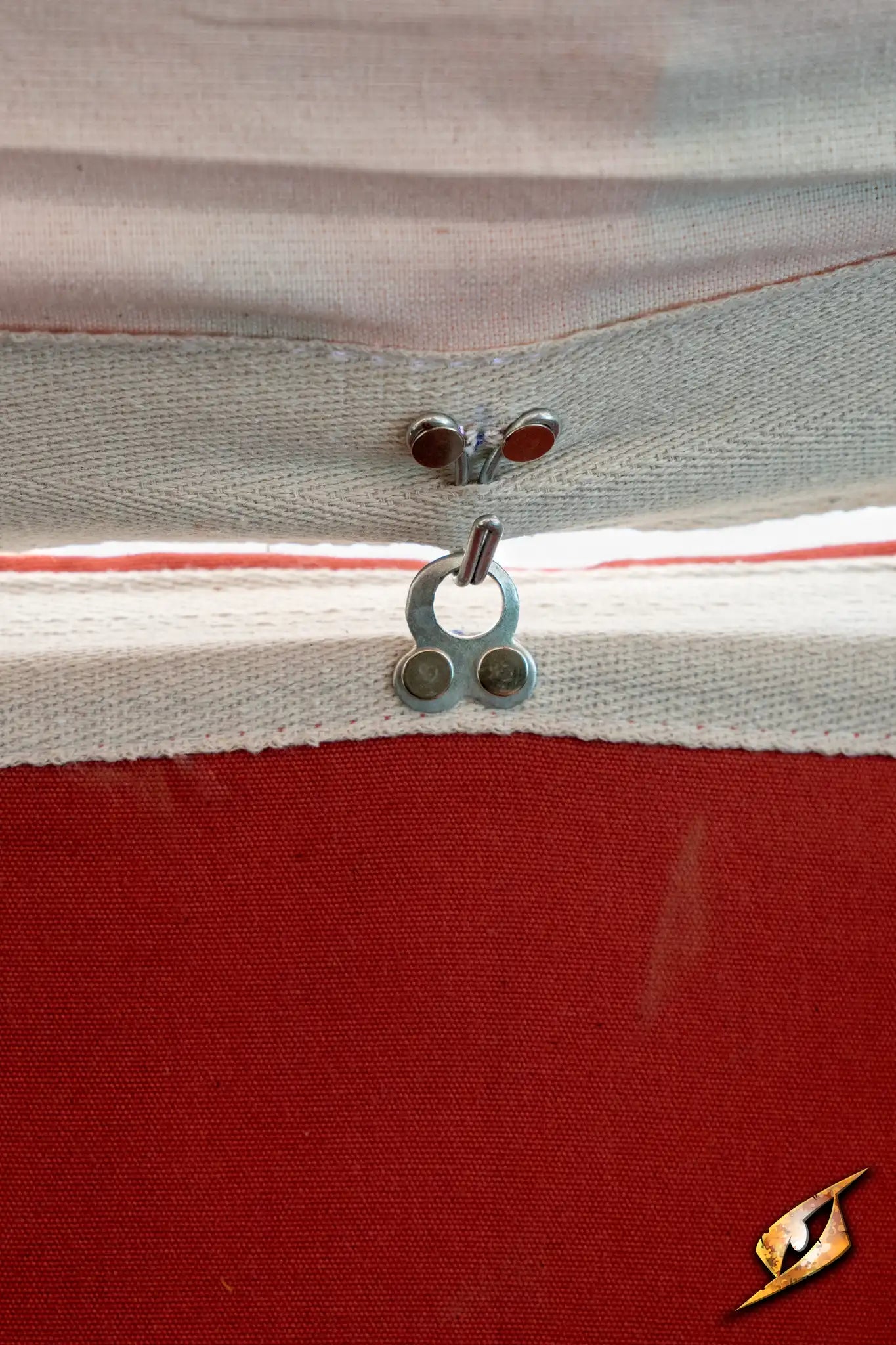 Close-up of a Marquee Tent - 4x6m fabric with grommet and cord detail.
