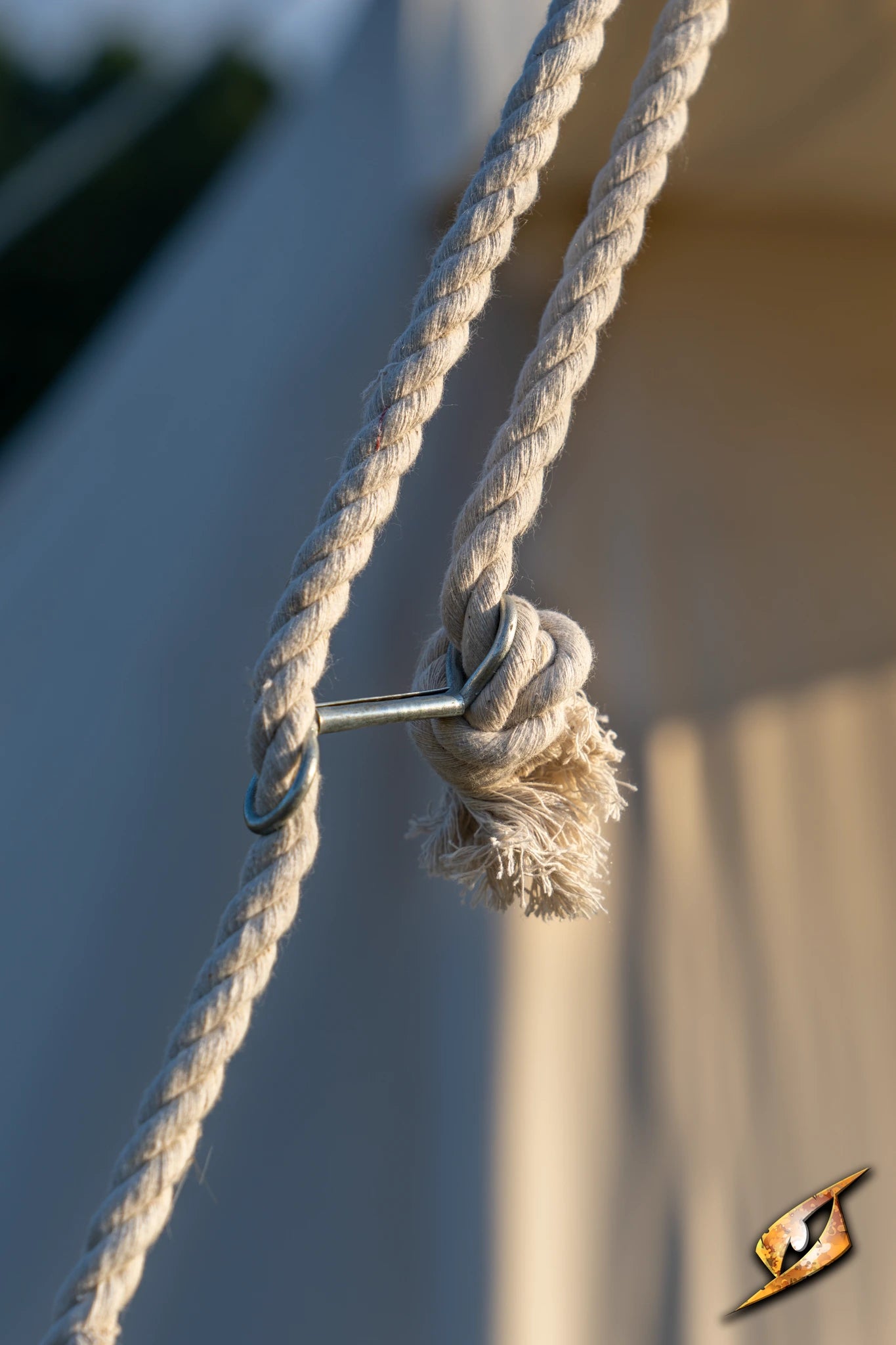 Close-up of the rope and toggle securing the Double Wedge Tent - 3x5 m in outdoor settings.