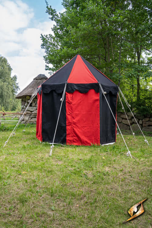 Round Pavilion Tent - 3m in red and black colors set up in a grassy area surrounded by trees.