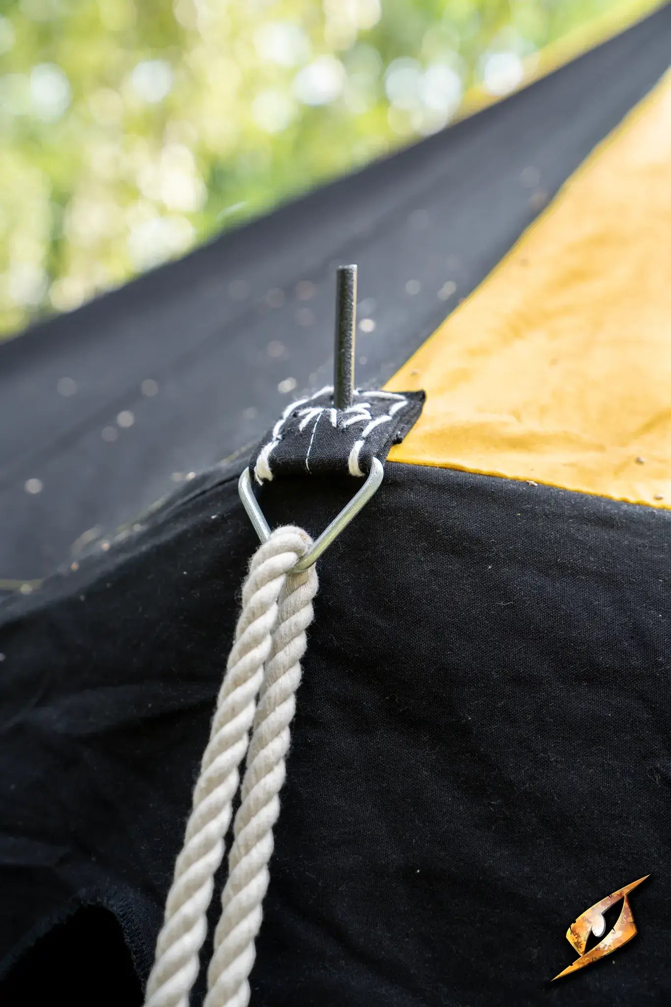 Round Pavilion Tent - 3m close-up of tent attachment point with rope and stake.