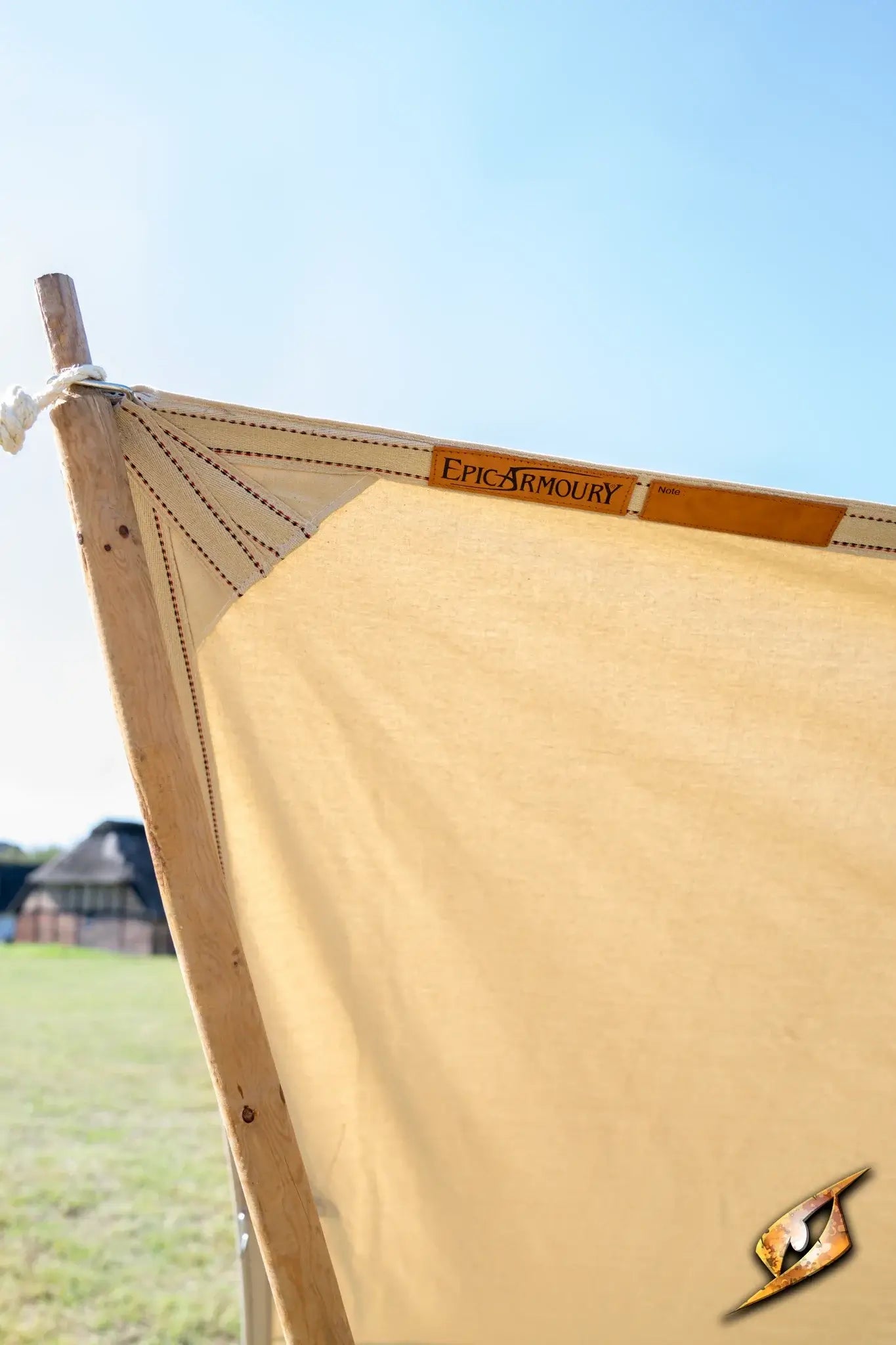 Epic Armoury tarpaulin showcasing durable fabric and design in outdoor setting.