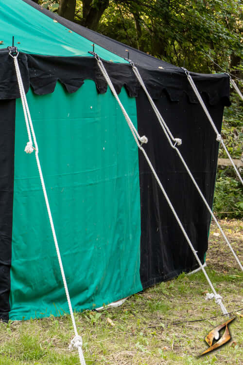 Marquee Tent - Sides - 5x8m with ropes securing the structure in a natural setting.