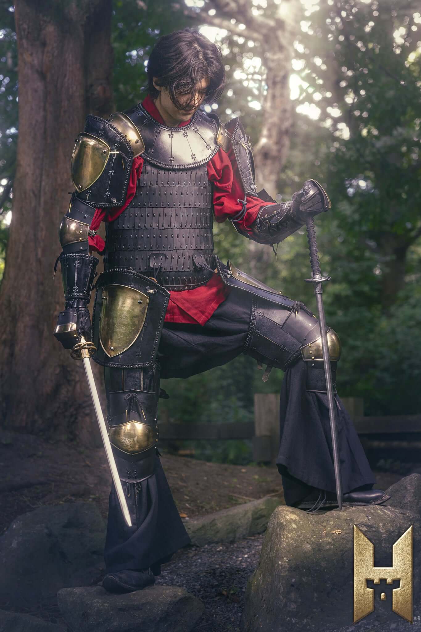 A warrior in armor poses confidently with Ryūgan the Katana in a scenic outdoor setting.