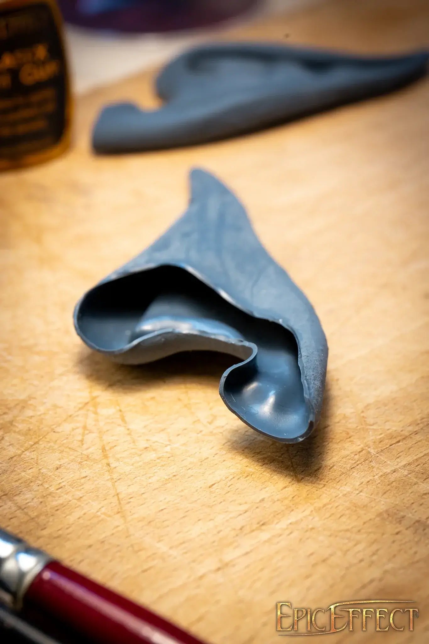 Elven Ears Long, realistic long pointed ears for cosplay and costume events, detailed design on wooden surface.