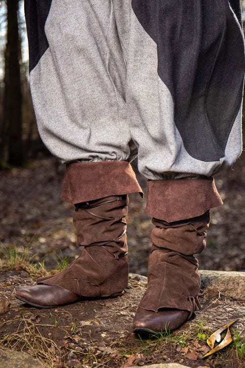 Theoderic gaiters worn with snug pants, showcasing a stylish and practical look in a natural outdoor setting.