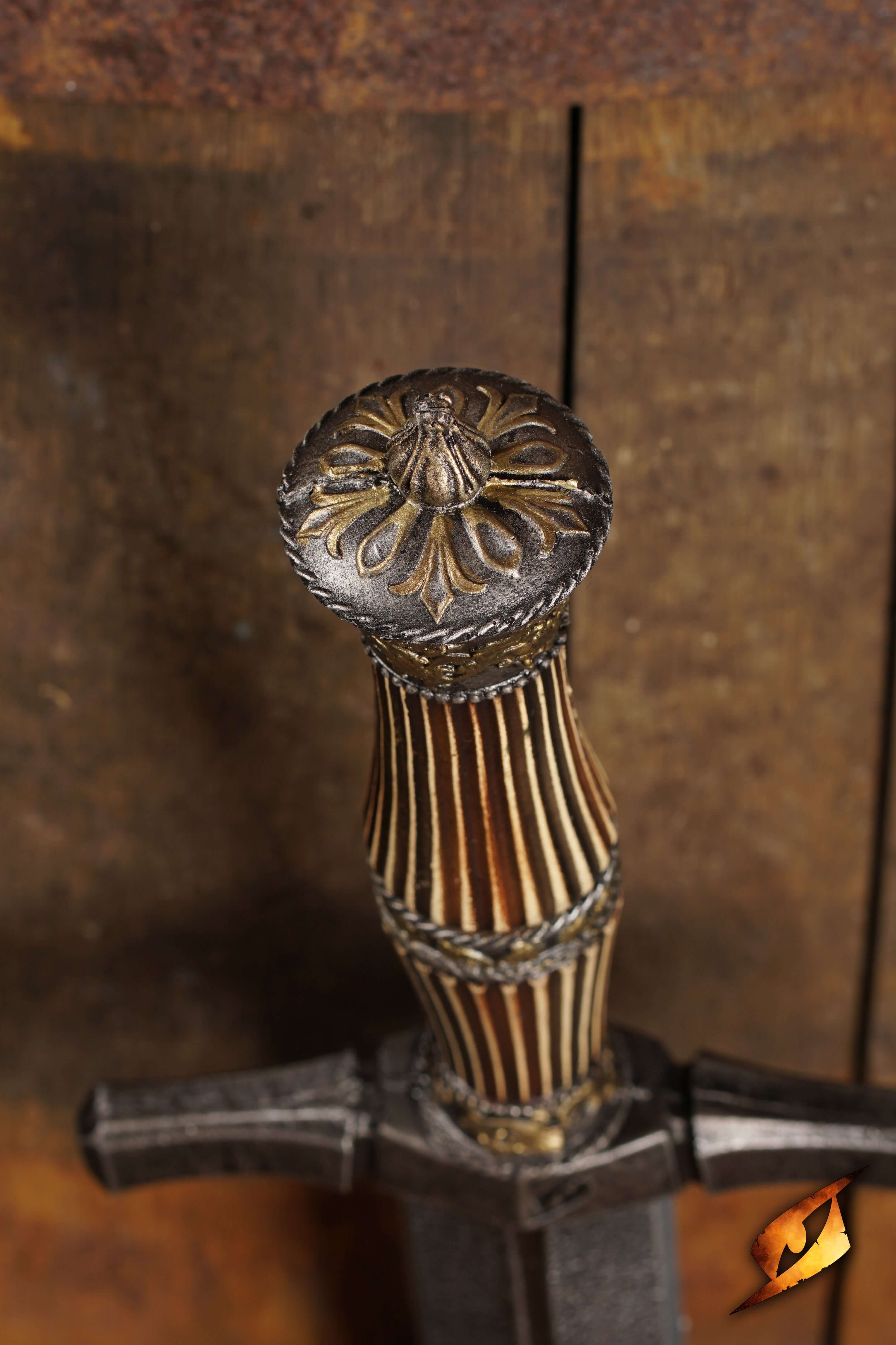 Ornate handle of the Blocking Dagger with detailed design and craftsmanship, showcasing its unique features.
