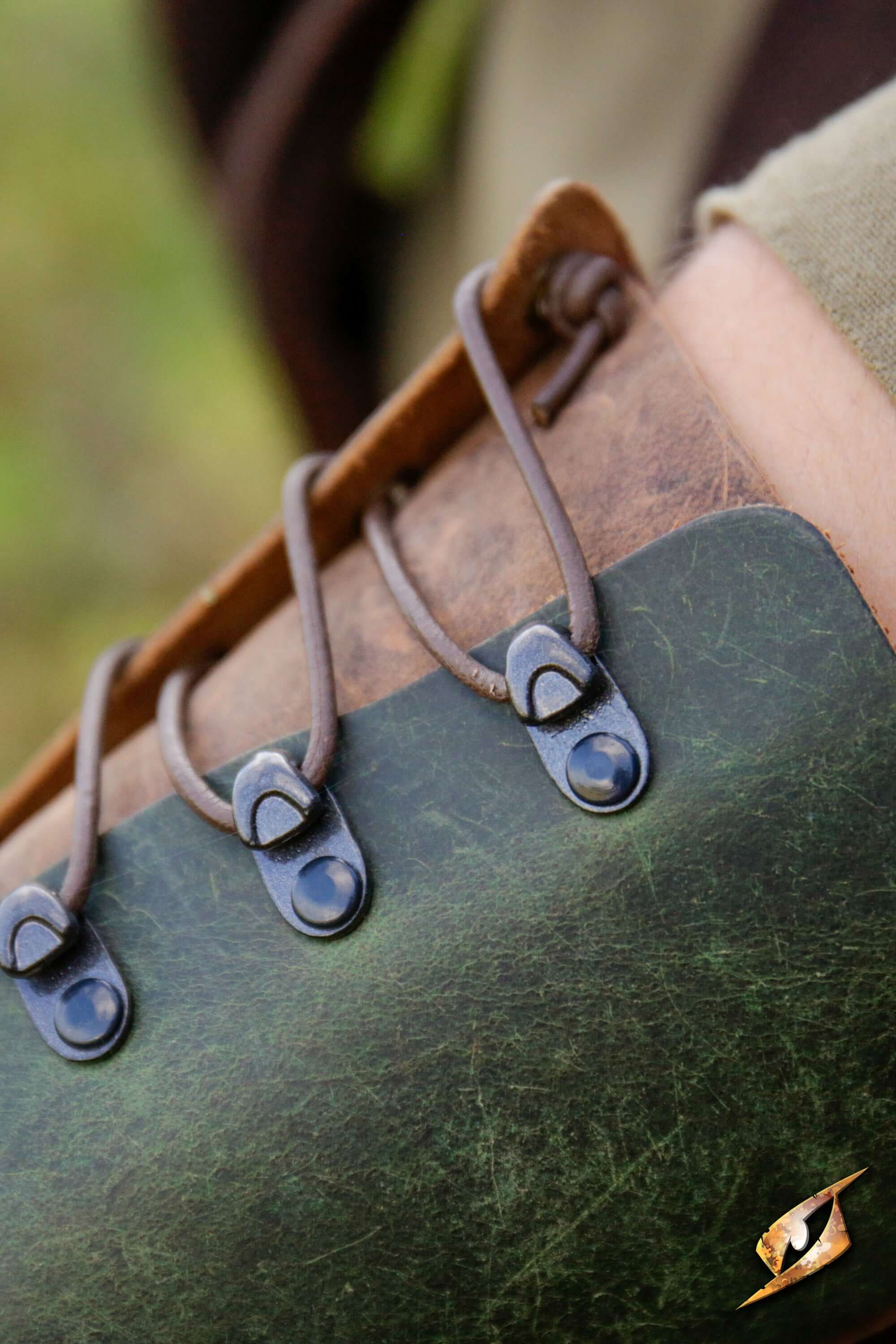 Close-up of the Glade Warden Bracer showcasing its leather craftsmanship and secure lacing details.